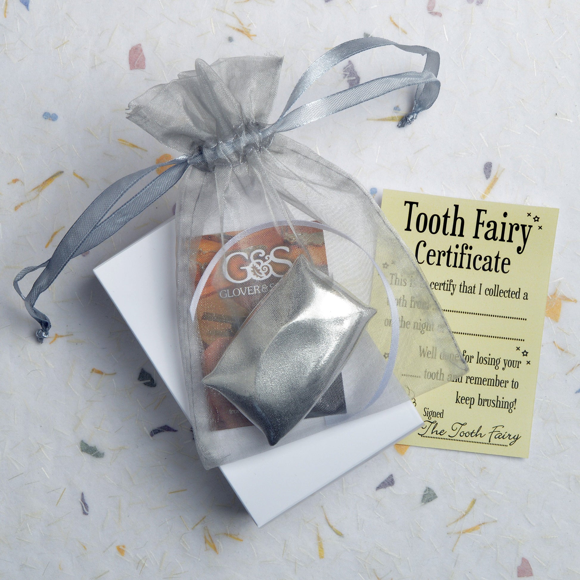 A tooth fairy box. A pewter pillow shaped box with the words 'From the tooth Fairy' written inside the lid. With gift certificate. UK handmade