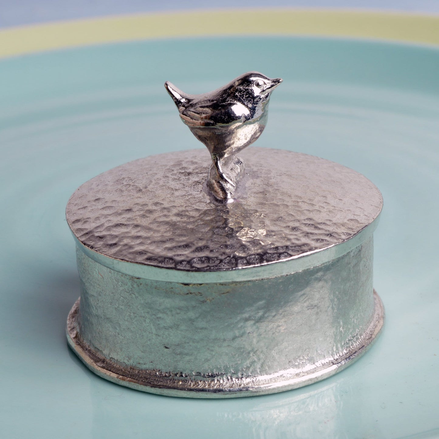 Wren pewter personalised trinket box. Our round wren keepsake box features a Jenny wren sculpture as a handle. The underside of the lid can be engraved with your personalised message. 