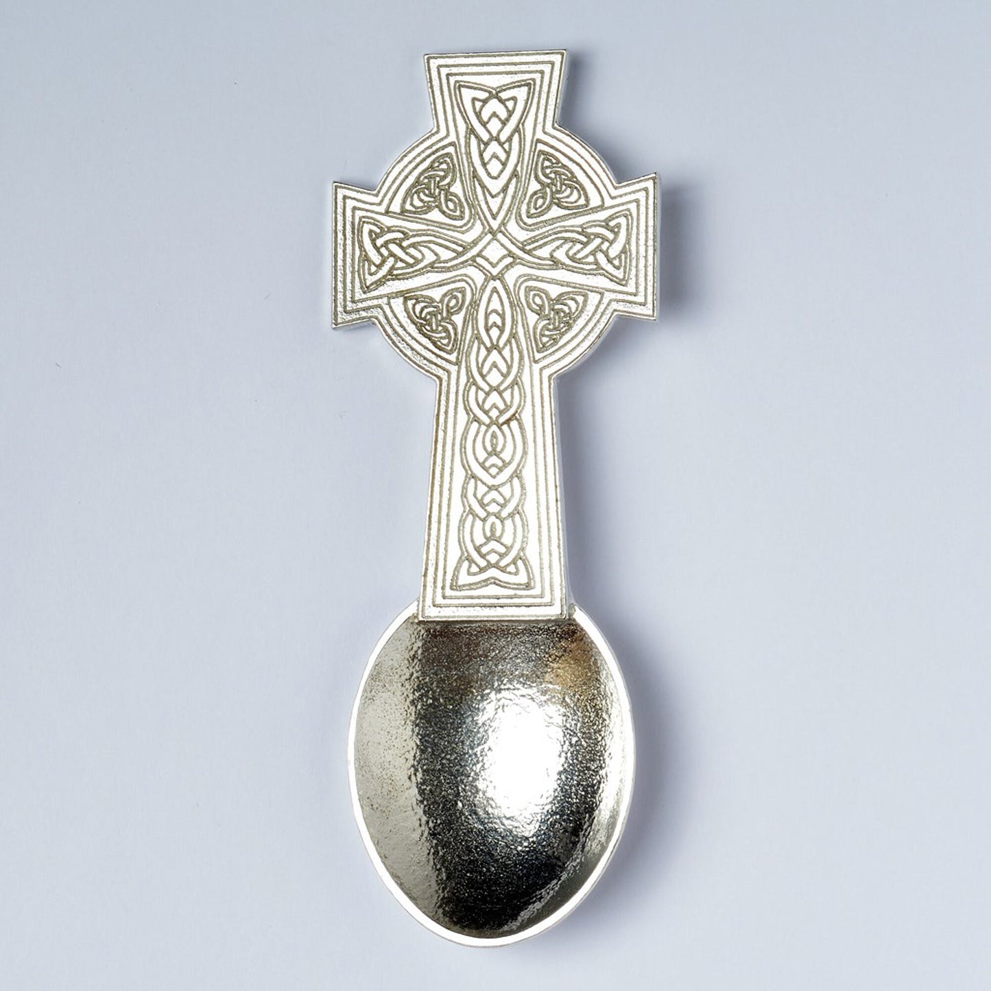 A Celtic cross designed Christening spoon with the words On Your Christening on the back. We engrave your message on the central panel. Christening gifts for boys and girls. UK handmade