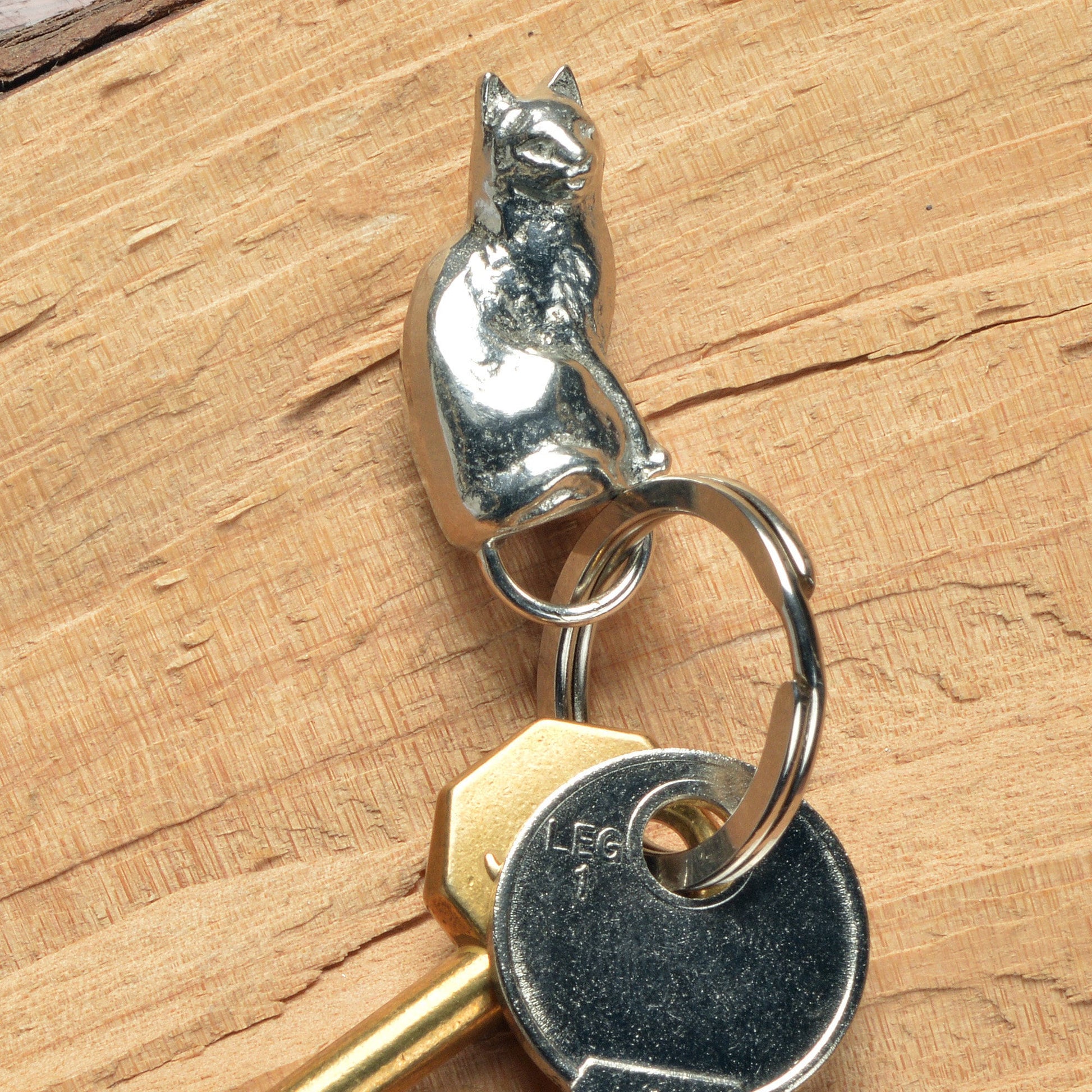 An elegant and beautiful solid pewter cat keyring on a quality stainless steel ring. Cat gifts, gifts for cat lovers, Pewter keyring gifts. Housewarming gifts.