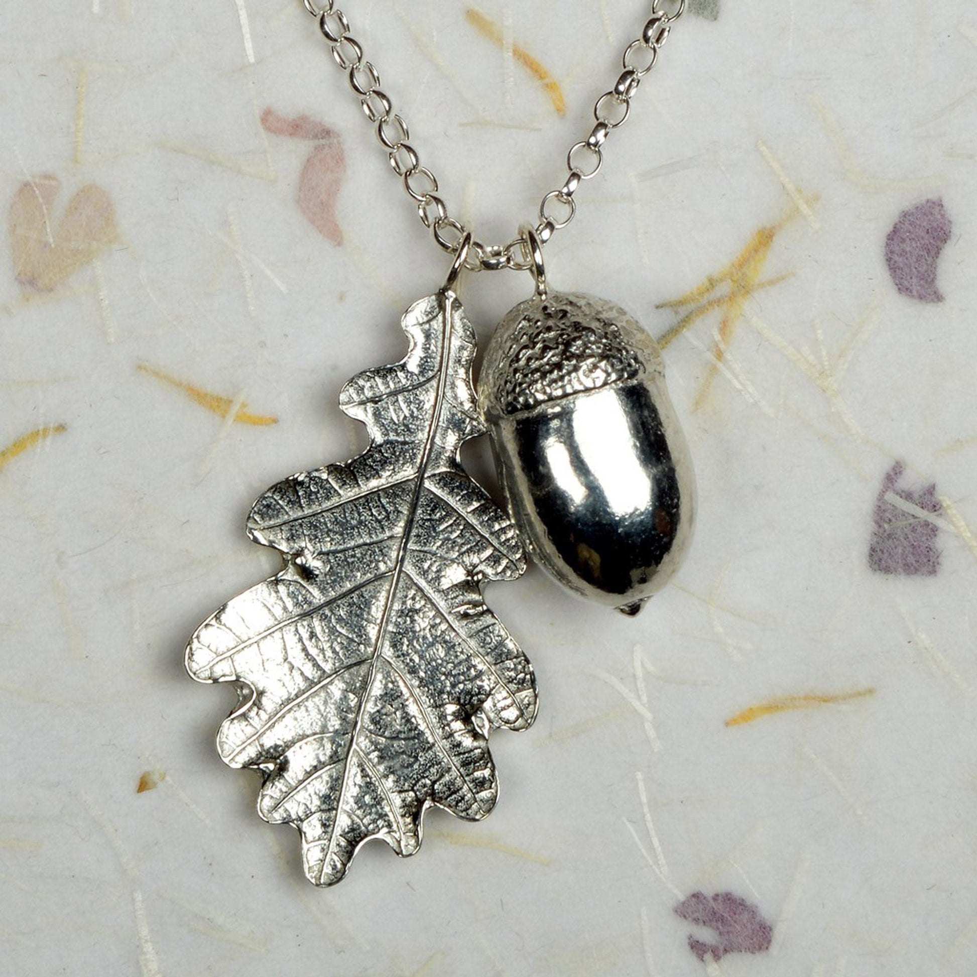 A delicate and detailed pewter oak leaf and acorn necklace (Large) on an 30" Sterling silver chain. Great jewellery gifts for her. The perfect 10th tin 10 year wedding anniversary gift (Our pewter is 95% tin). Made in Britain with love.