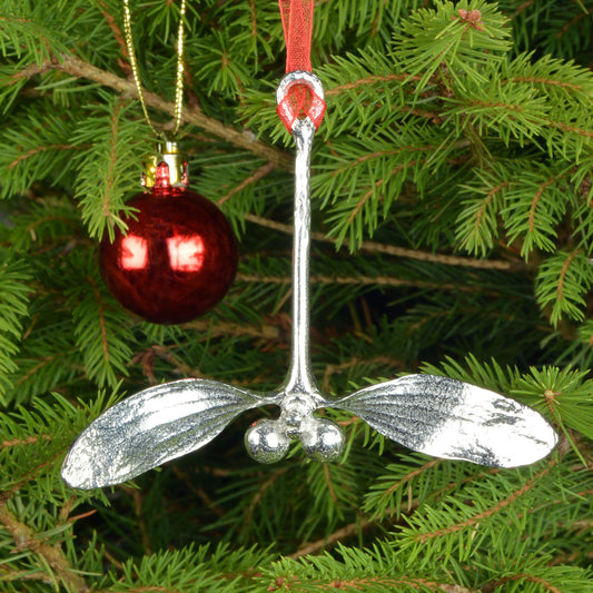 Our beautifully textured & detailed pewter Mistletoe hangs from a red ribbon providing a gorgeous hanging Christmas tree decoration gifts. Pewter Christmas tree decorations, unusual Christmas decorations made in Britain