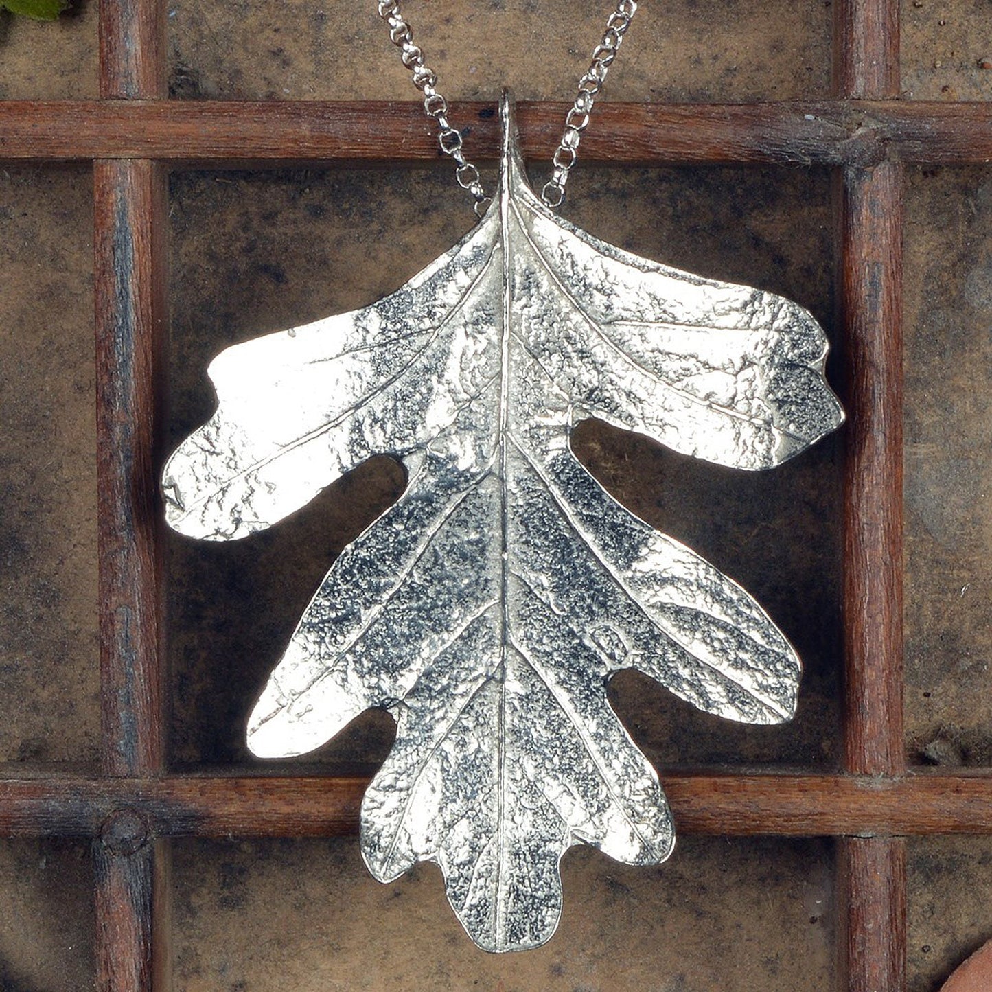 A detailed pewter hawthorn leaf necklace on an 18" Sterling silver chain. Gifts for nature lovers, hawthorn leaf jewellery. Great jewellery gifts for her. The perfect 10th tin 10 year wedding anniversary gift (Our pewter is 95% tin). Made in Britain with love.