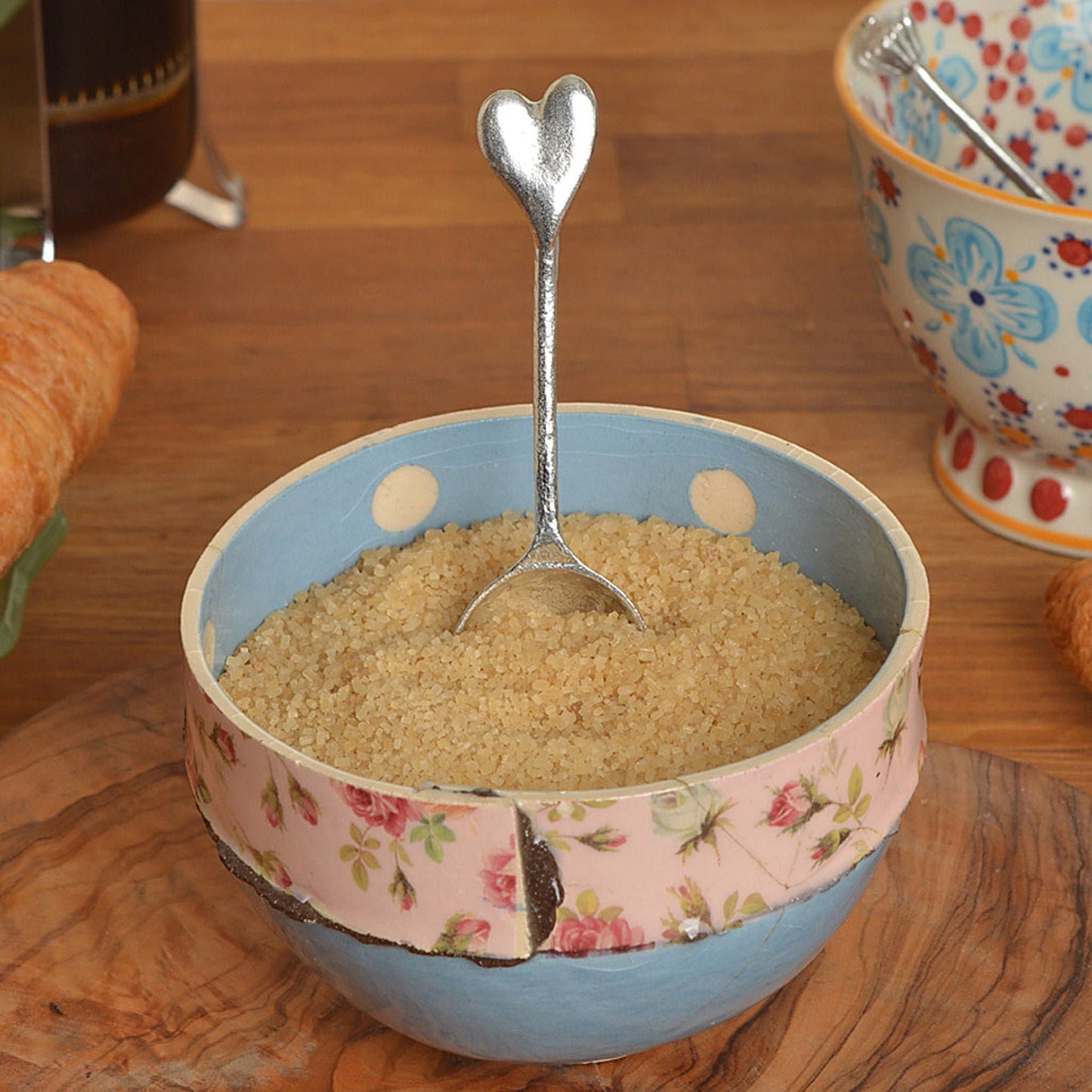 A small spoon pewter sugar teaspoon  with a love heart on the end. Our love spoon makes an ideal little love token or 10th tin wedding anniversary gift or small wedding gift.