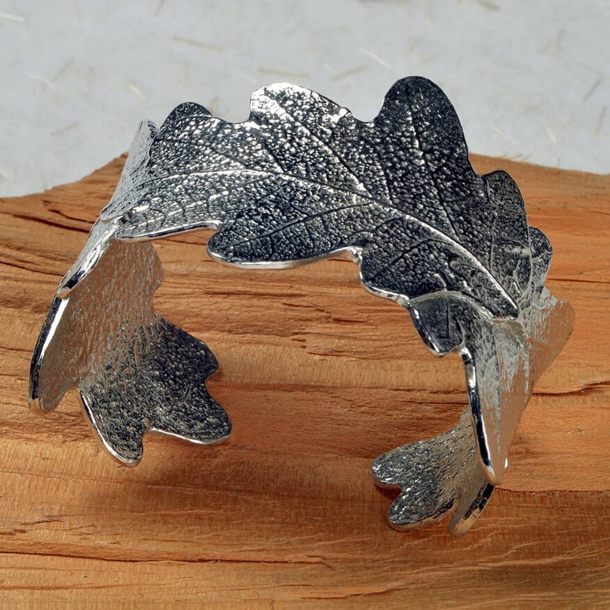 Pewter oak leaf cuff bangle, oak leaf bracelet gifts. 3 beautifully textured oak leaves overlap to create a stunning pewter oak leaf cuff bangle or bracelet. For anyone who loves big, but delicate, jewellery. Gifts for nature lovers.