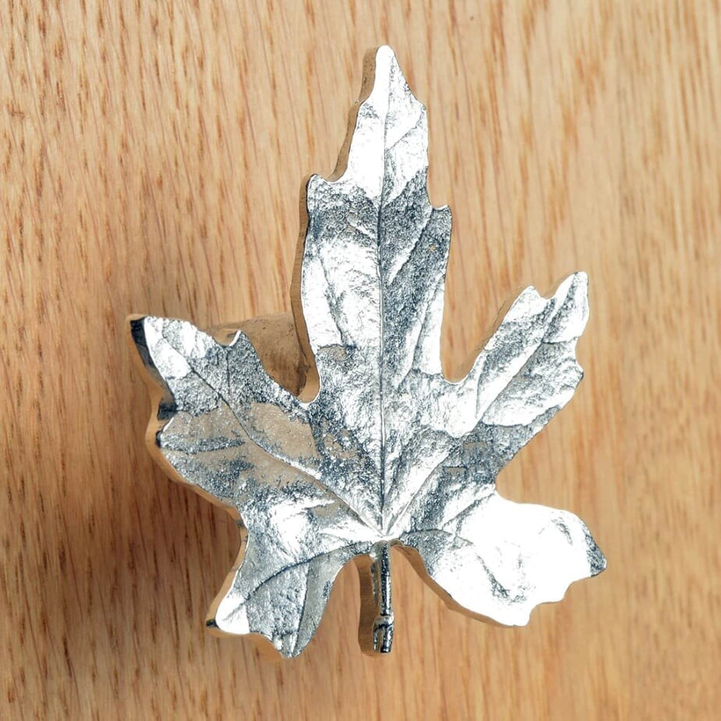 A solid pewter cabinet handle, cupboard knob, furniture handle or drawer pull in the shape of a detailed maple leaf. Organic, unusual handles UK handmade with finesse