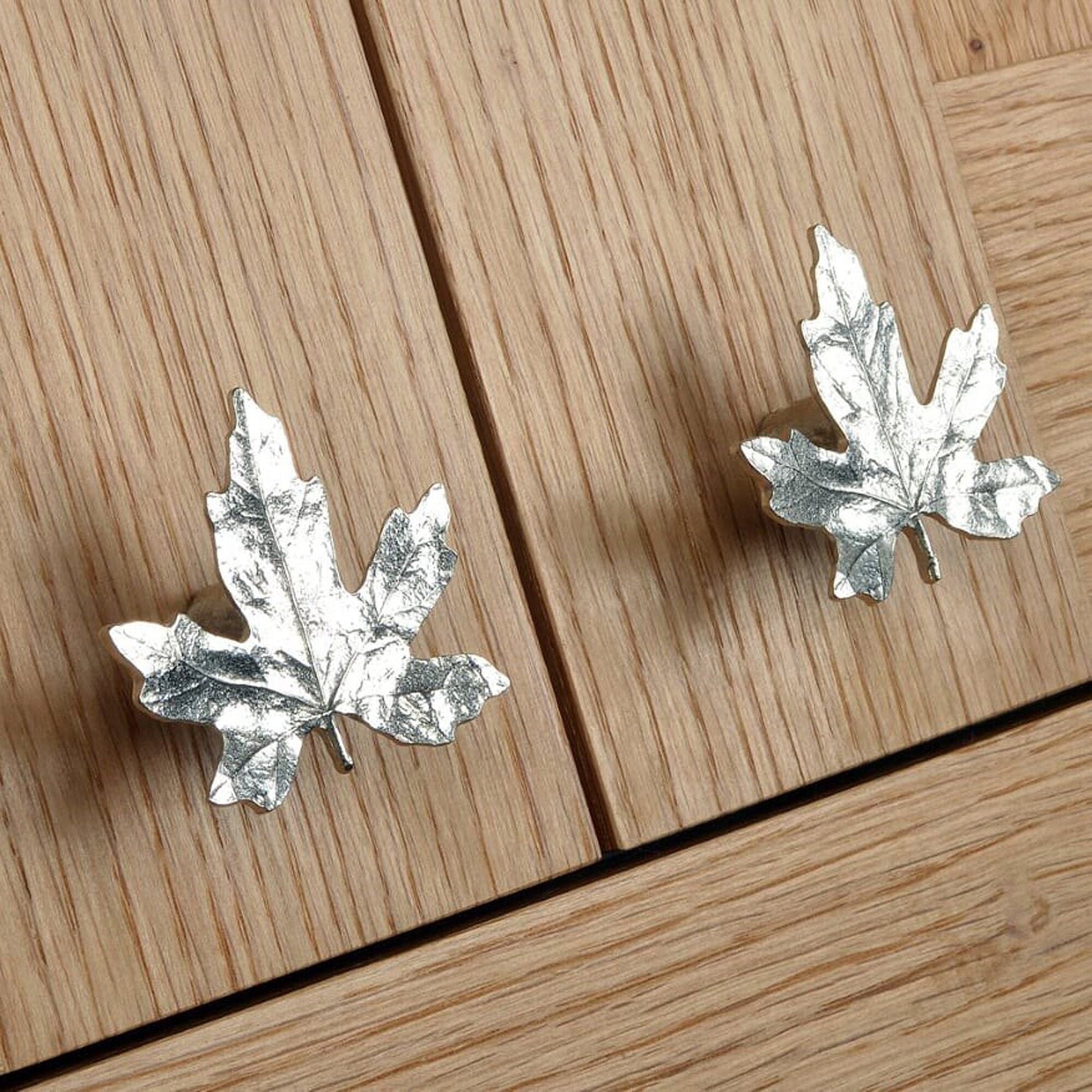 A solid pewter cabinet handle, cupboard knob, furniture handle or drawer pull in the shape of a detailed maple leaf. Organic, unusual handles UK handmade with finesse