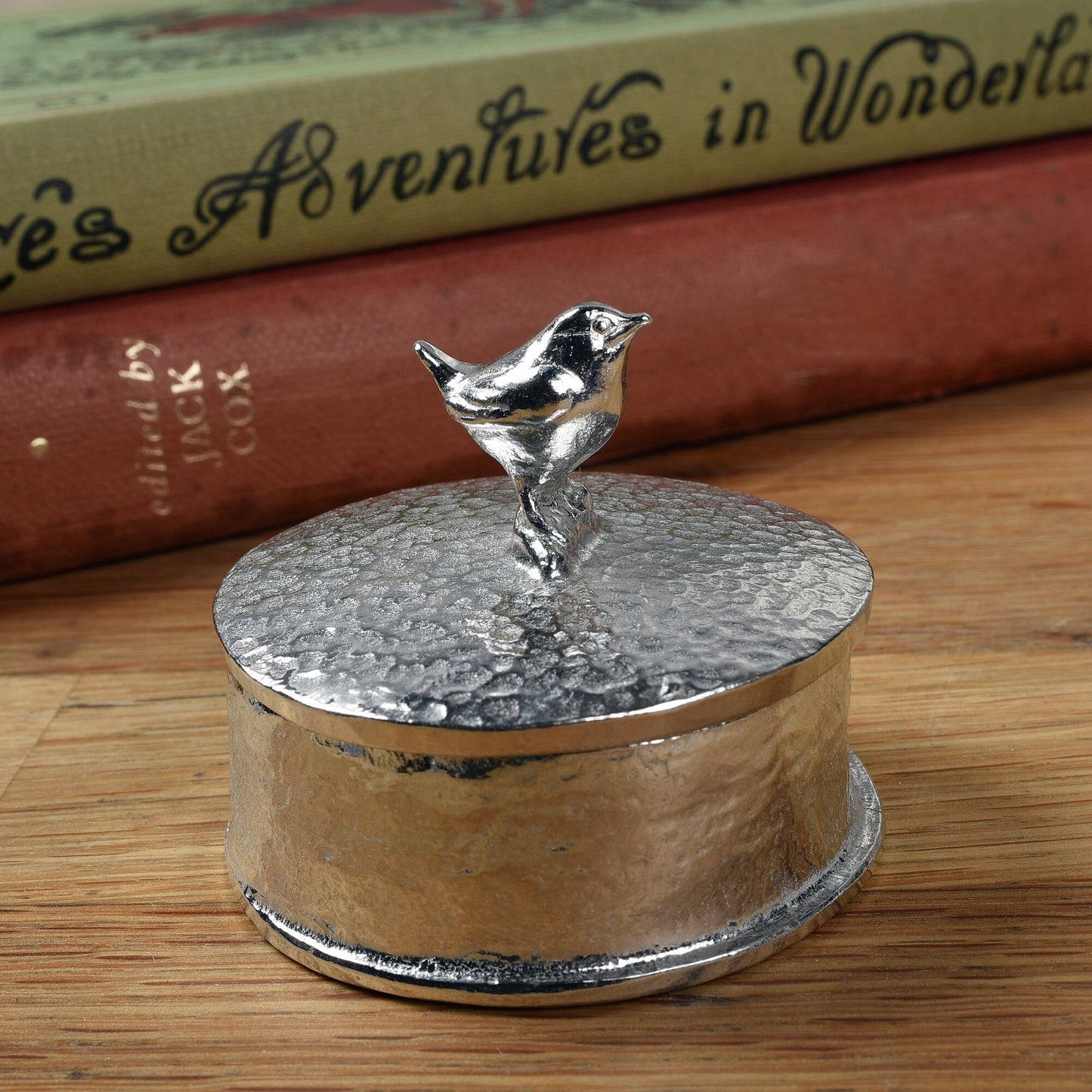 Wren pewter personalised trinket box. Our round wren keepsake box features a Jenny wren sculpture as a handle. The underside of the lid can be engraved with your personalised message. 