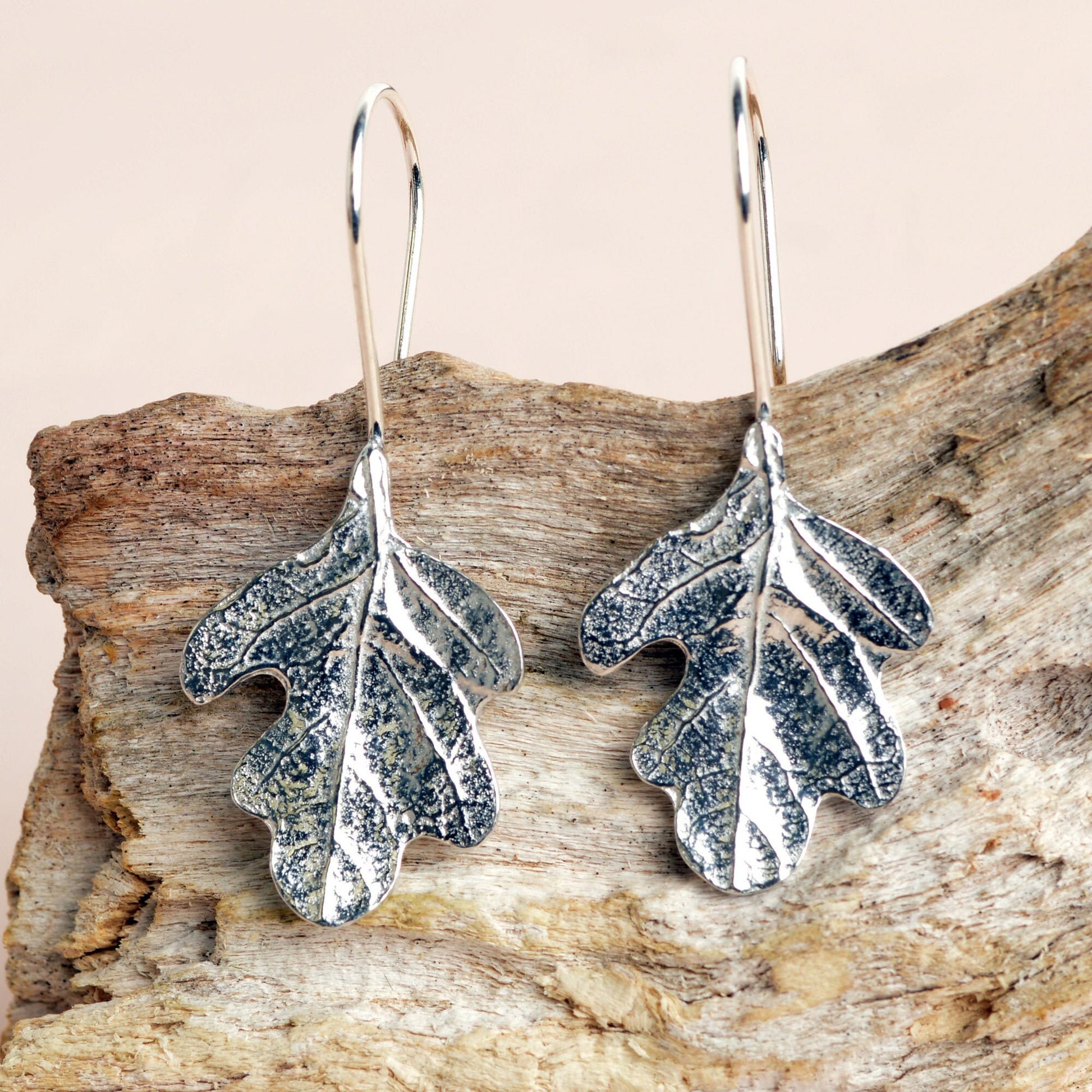 Oak leaf drop earrings, pewter oak leaves on Sterling silver ear hooks. Pewter and silver leaf jewellery gifts, handmade in the UK by Glover and Smith