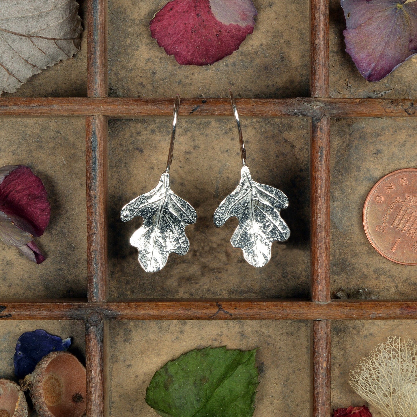 Oak leaf drop earrings, pewter oak leaves on Sterling silver ear hooks. Pewter and silver leaf jewellery gifts, handmade in the UK by Glover and Smith