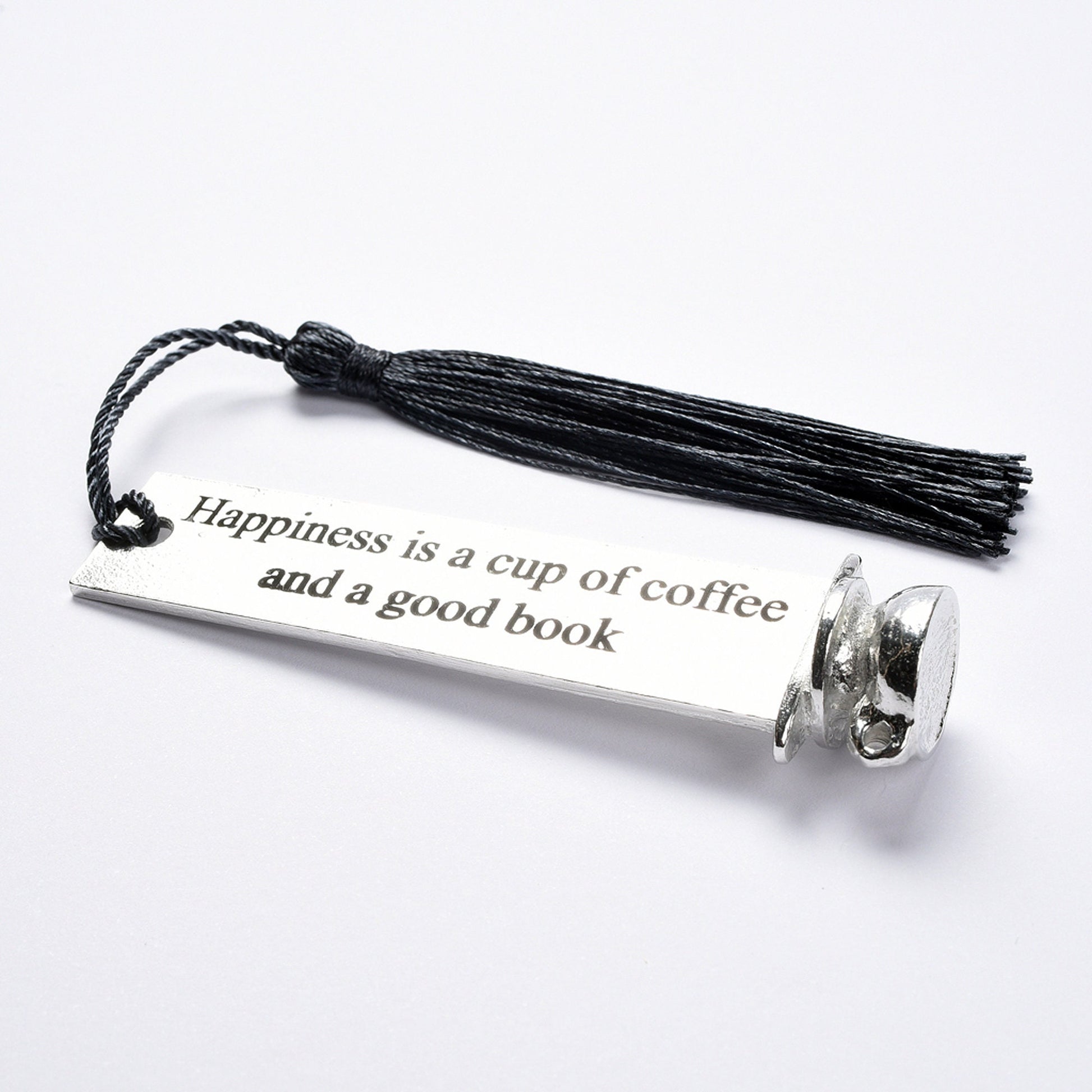 A personalised engraved pewter metal  bookmark with a coffee cup on the top. On the front the quotation 'Happiness is a cup of coffee and a good book'. We engrave the back with your message. Gifts for coffee lovers, book lovers gifts.