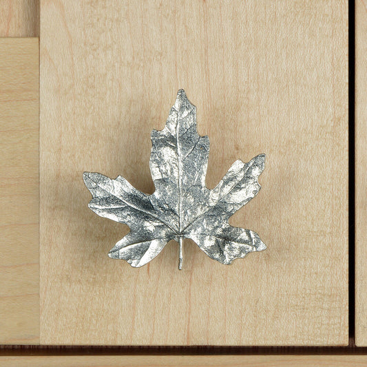 A solid pewter cabinet handle, cupboard knob, furniture handle or drawer pull in the shape of a detailed maple leaf. Organic, unusual handles UK handmade with finesse