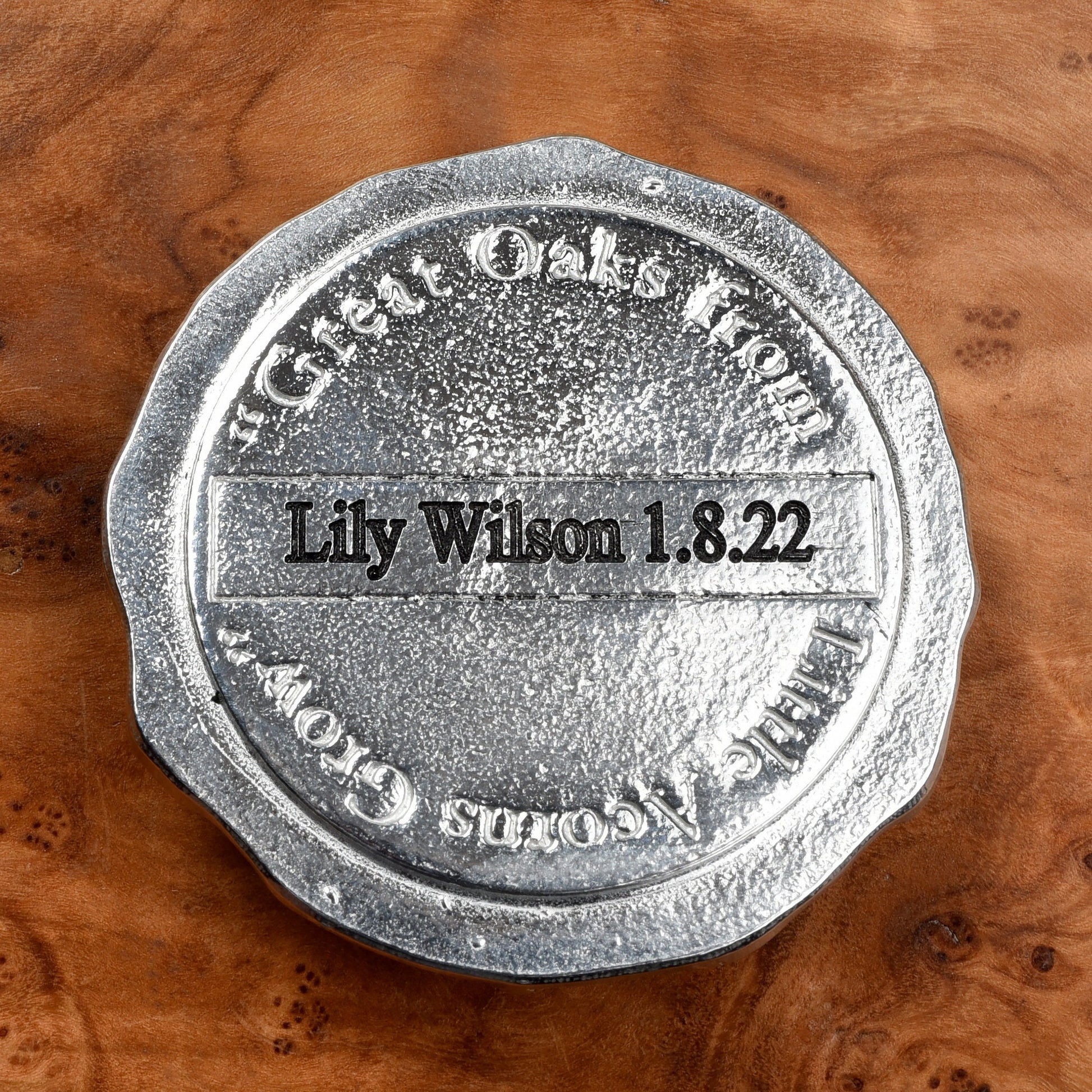 A personalised, engraved pewter little acorns box. The lid has an acorn surrounded by a garland of oak leaves. 'Great oaks from little acorns grow' is written under the lid. Christening gifts for boys and girls