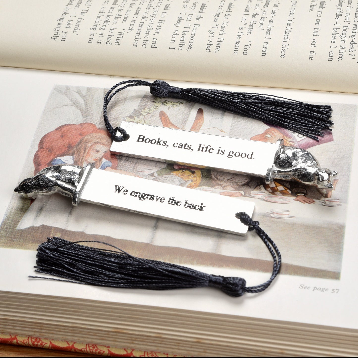 A personalised engraved pewter metal  bookmark with a cat sculpture on the top. On the front the quotation 'Cats, books, life is good'. We engrave the back with your message. Gifts for cat lovers, book lovers gifts, cat gifts.