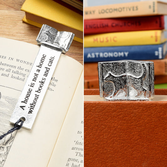 A pewter metal  bookmark with a cat silhouette wandering across an open book on the top. On the front the quotation 'A house is not a home without books and cats'. Gifts for cat lovers, book lovers gifts, cat gifts.