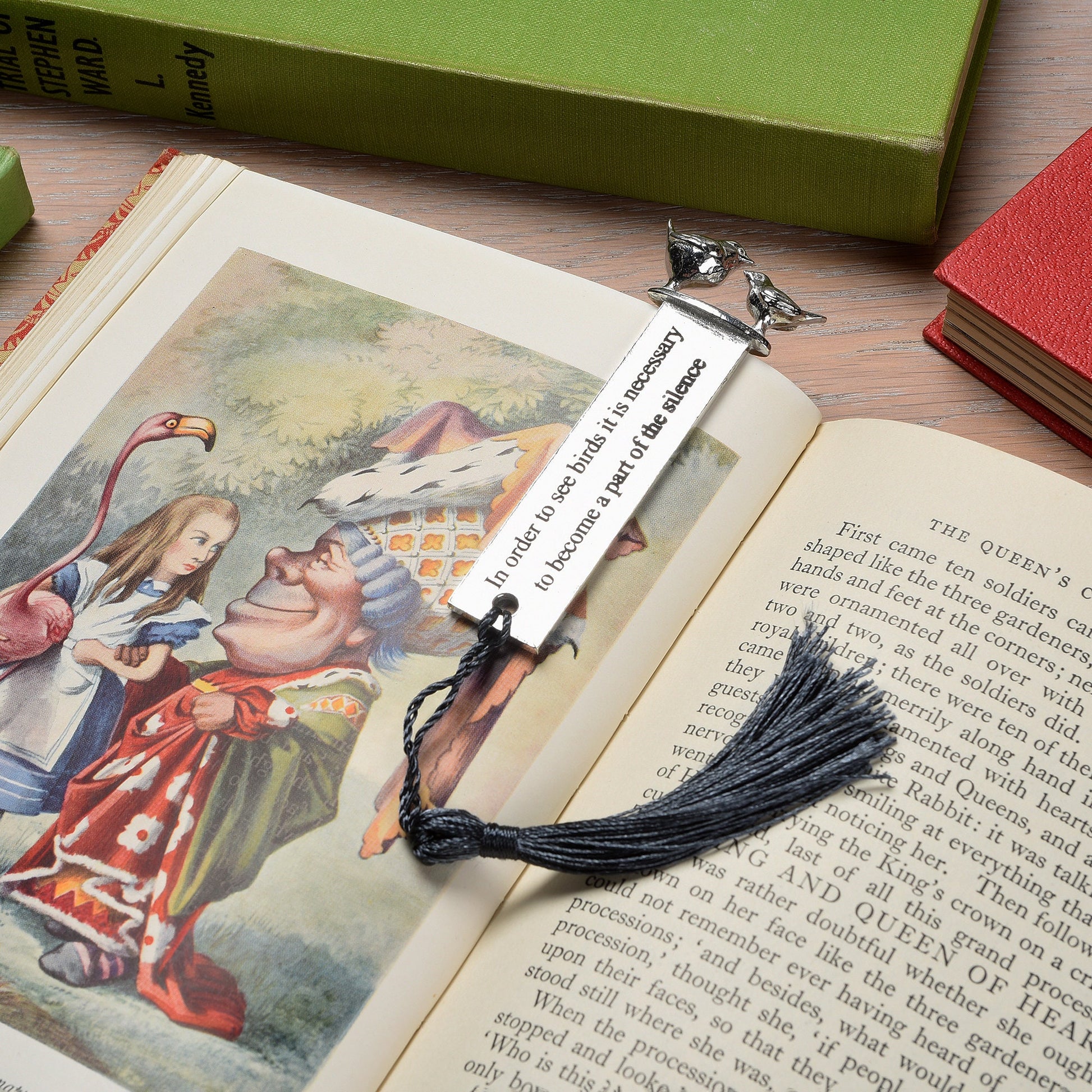 A personalised engraved pewter metal  bookmark with a wren and a robin on the top. On the front the quotation 'In order to see birds it is necessary to become part of the silence'. We engrave the back with your message. Gifts for bird lovers, book lovers