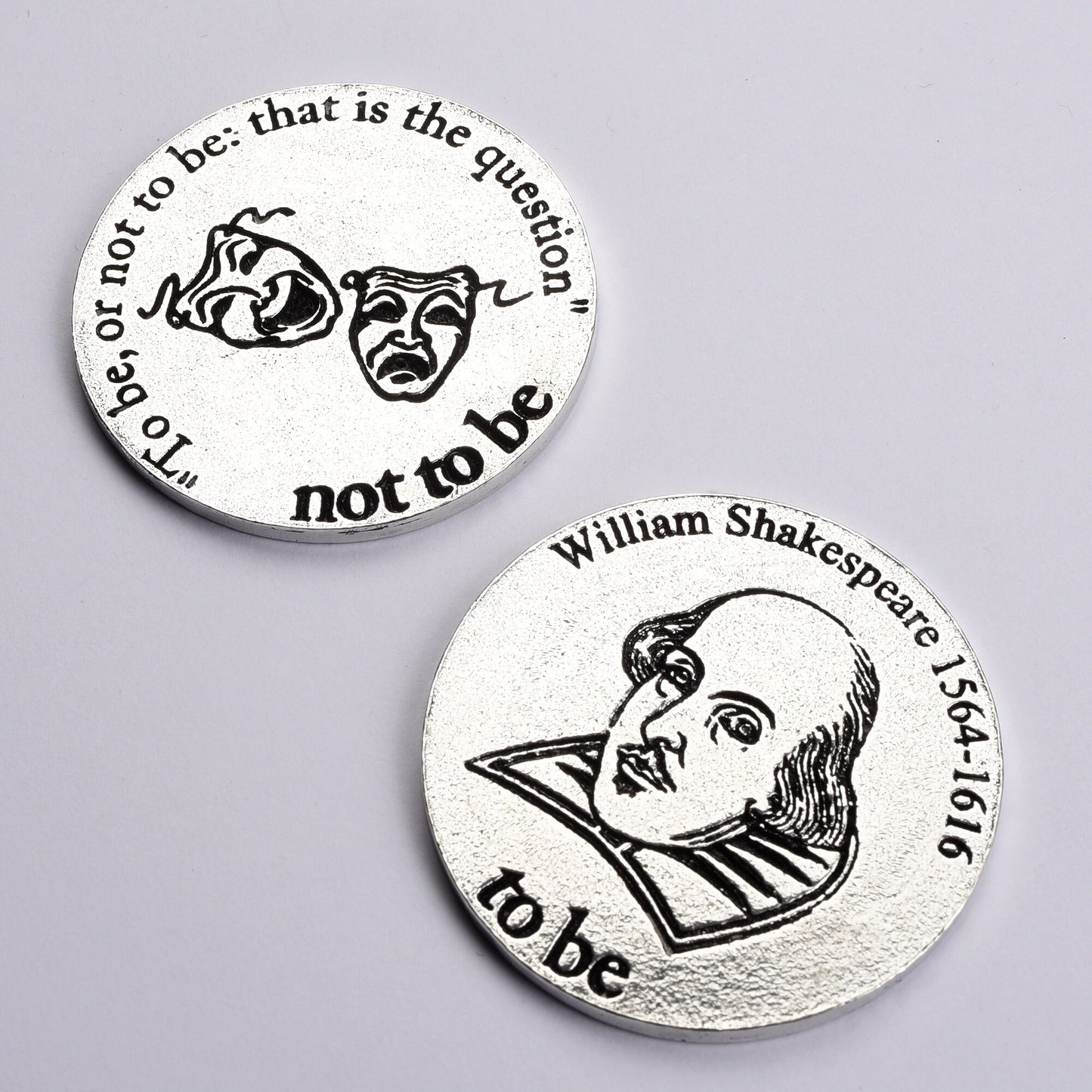 Shakespeare gifts. Inspired by Hamlet's famous 'To be, or not to be' soliloquy, this charming pewter Shakespeare decision coin gift has 'to be' on one side and 'not to be' on the other. UK handmade pewter.