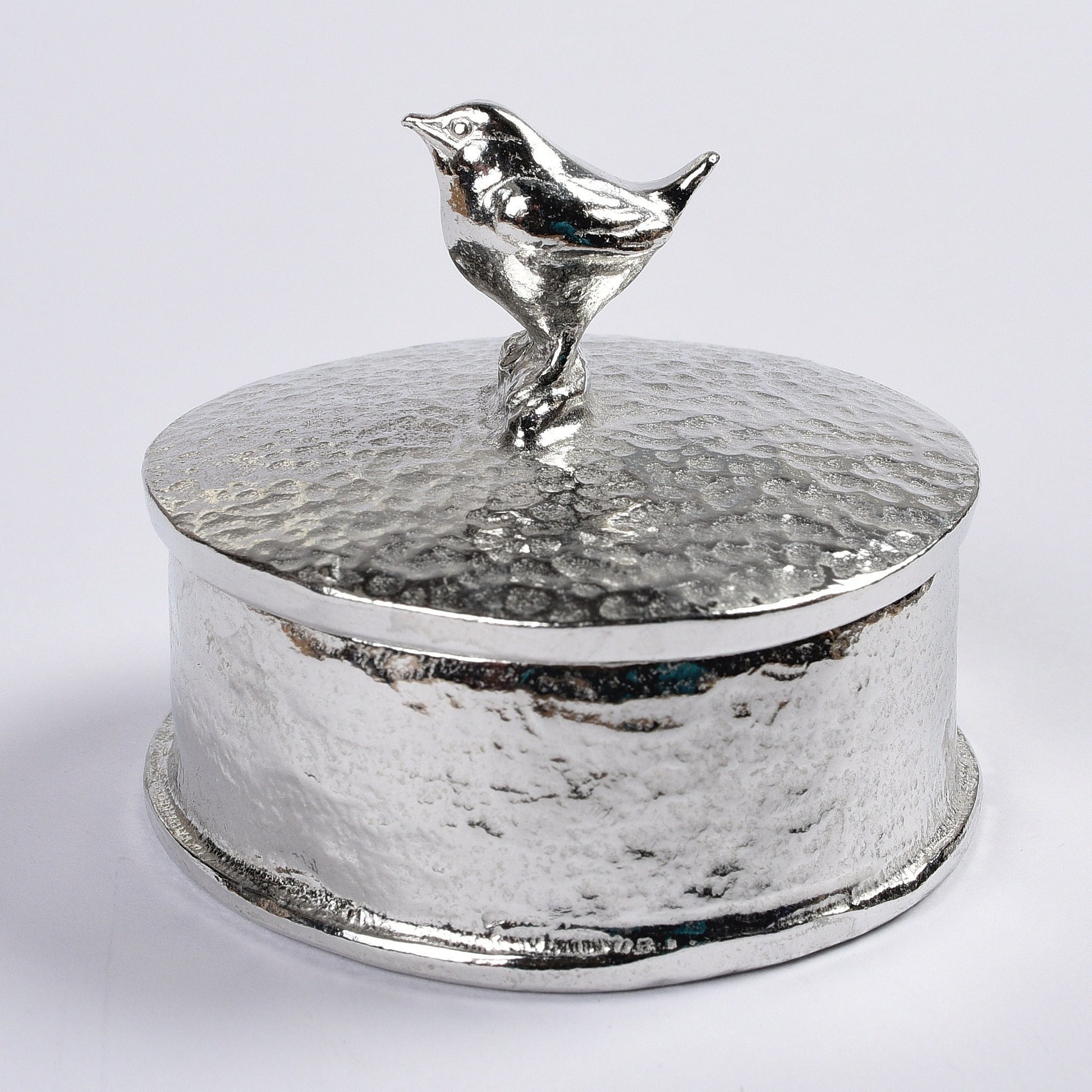 Wren pewter personalised trinket box. Our round wren keepsake box features a Jenny wren sculpture as a handle. The underside of the lid can be engraved with your personalised message. 