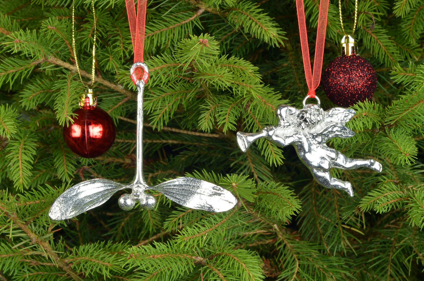 Our beautifully textured & detailed pewter Mistletoe hangs from a red ribbon providing a gorgeous hanging Christmas tree decoration gifts. Pewter Christmas tree decorations, unusual Christmas decorations made in Britain