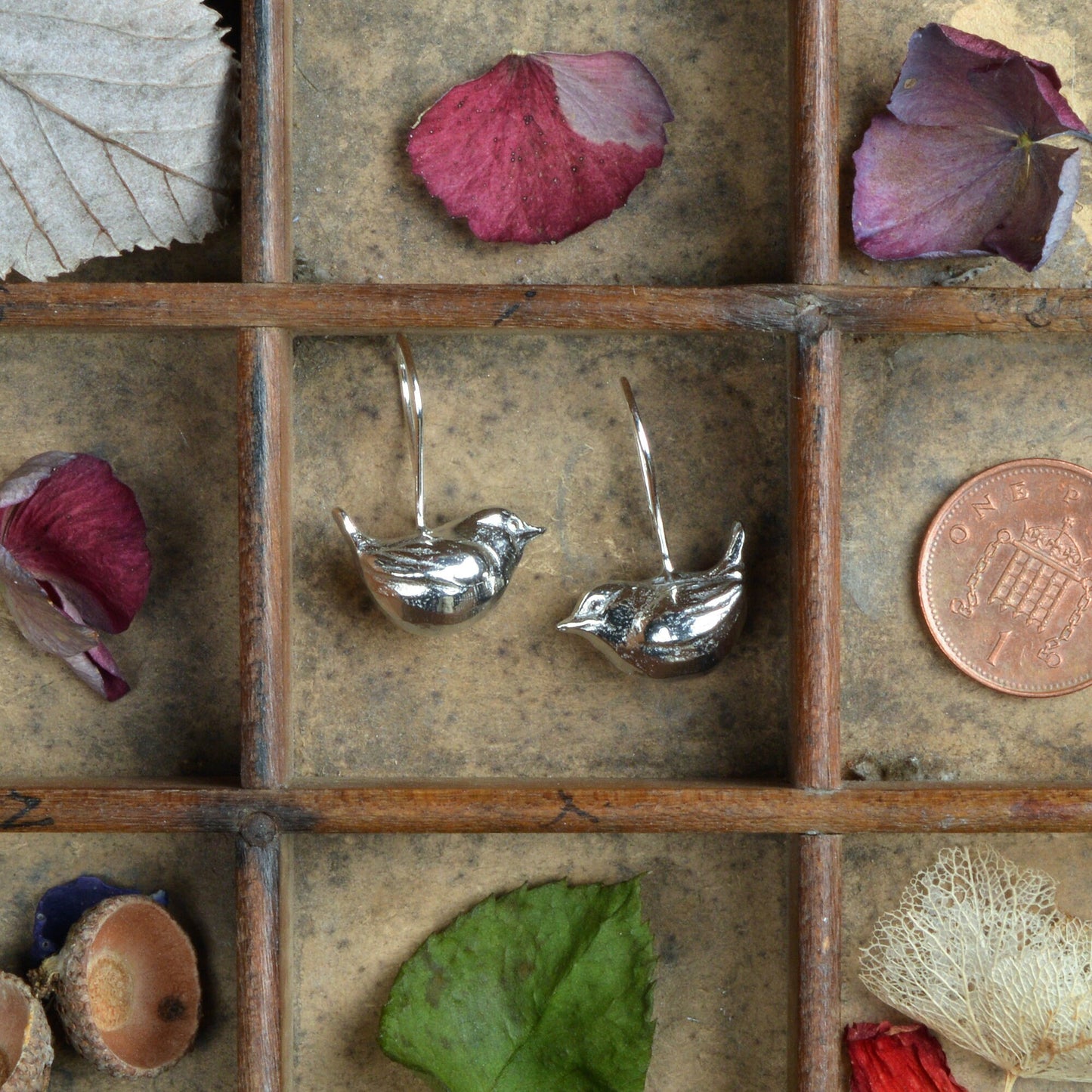 Wren bird drop earrings, pewter wrens on Sterling silver ear hooks. Pewter and silver wren jewellery gifts, handmade in the UK by Glover and Smith