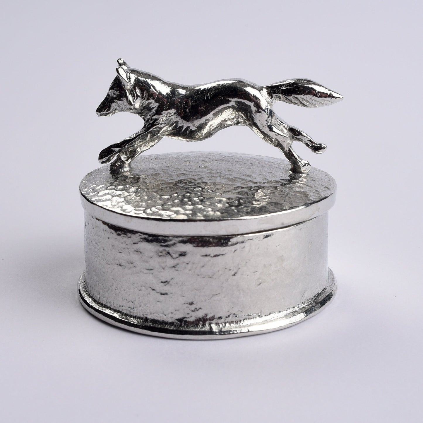 Fox pewter personalised trinket box. Our round keepsake box features a fox sculpture as a handle. The underside of the lid can be engraved with your personalised message. A perfect 10th (Tin) ten year wedding anniversary gift (Our pewter is 95% tin).