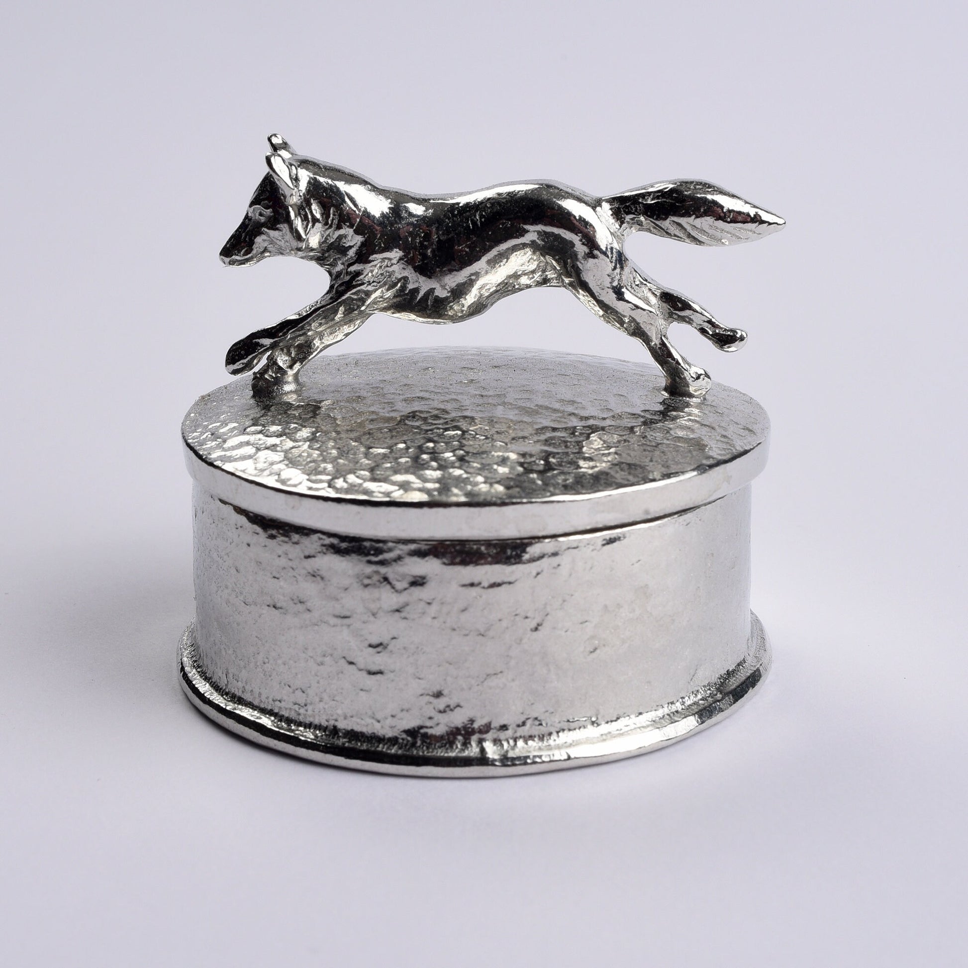 Fox pewter personalised trinket box. Our round keepsake box features a fox sculpture as a handle. The underside of the lid can be engraved with your personalised message. A perfect 10th (Tin) ten year wedding anniversary gift (Our pewter is 95% tin).