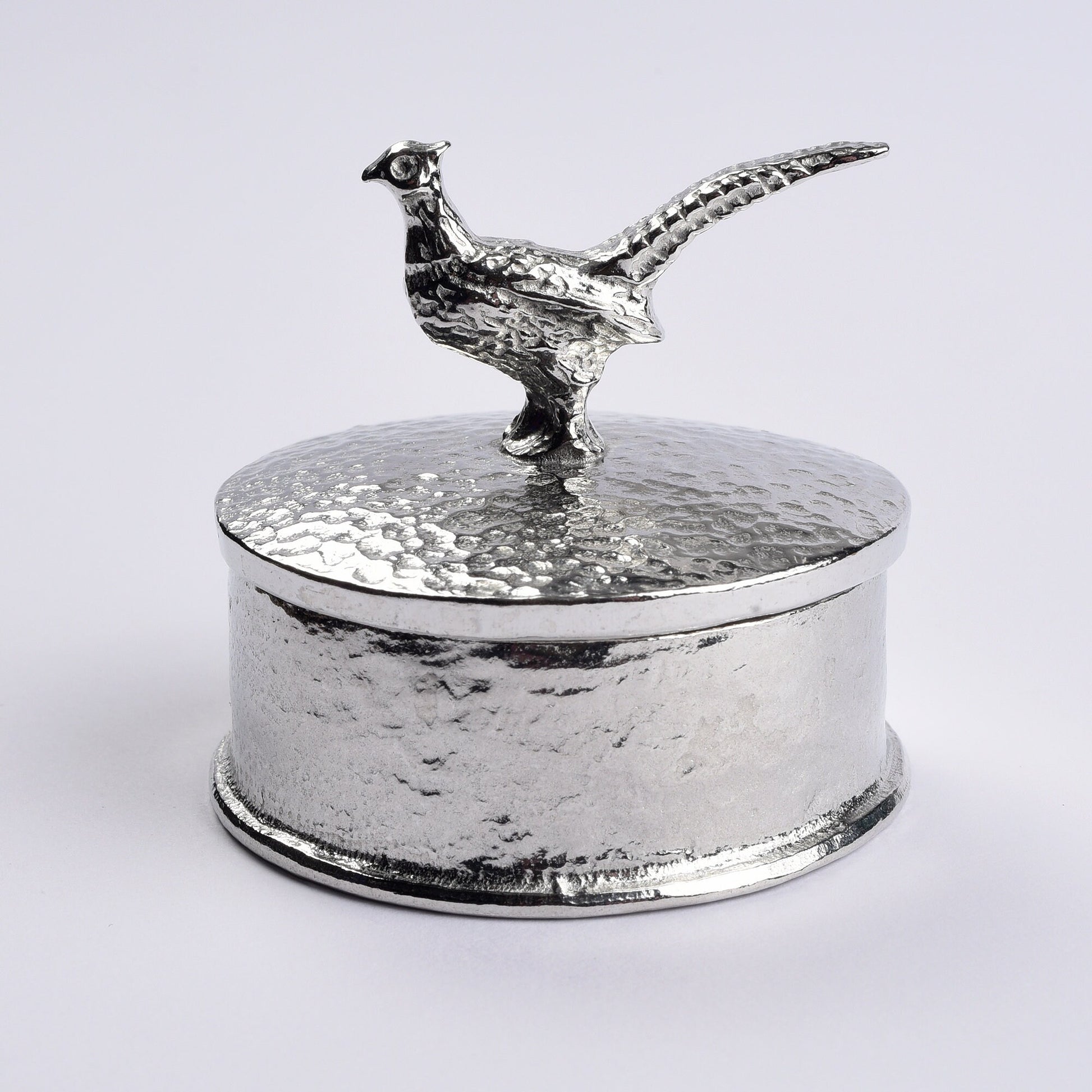 Pheasant pewter personalised trinket box. Our round pheasant keepsake box features a pheasant sculpture as a handle. The underside of the lid can be engraved with your personalised message. Pheasant gifts, personalised gifts for pheasant lovers.