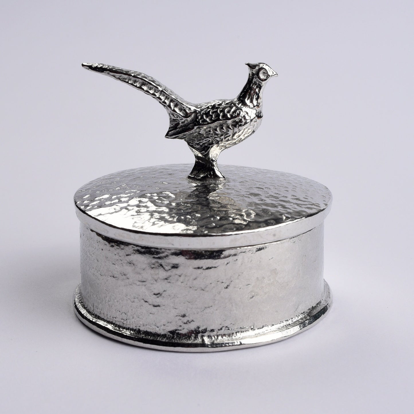 Pheasant pewter personalised trinket box. Our round pheasant keepsake box features a pheasant sculpture as a handle. The underside of the lid can be engraved with your personalised message. Pheasant gifts, personalised gifts for pheasant lovers.