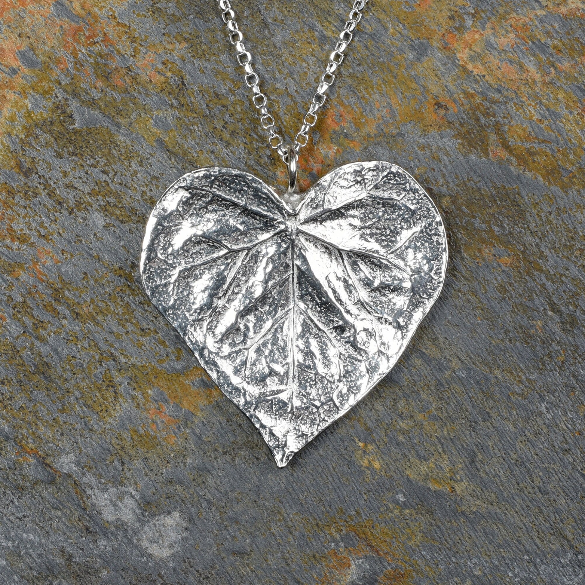 A detailed pewter heart shaped leaf necklace on an 18" Sterling silver chain. Gifts for nature lovers, heart leaf jewellery. Great jewellery gifts for her. The perfect 10th tin 10 year wedding anniversary gift (Our pewter is 95% tin). Made in Britain with love.