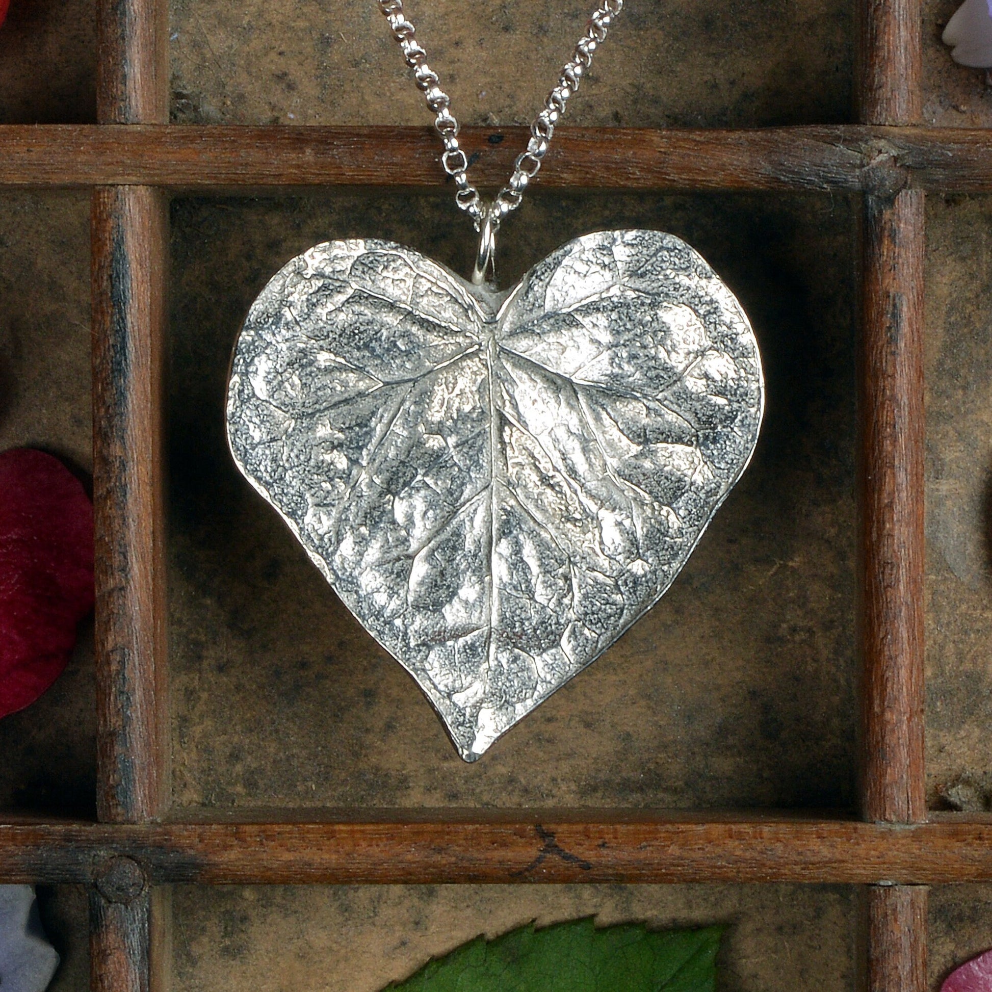 A detailed pewter heart shaped leaf necklace on an 18" Sterling silver chain. Gifts for nature lovers, heart leaf jewellery. Great jewellery gifts for her. The perfect 10th tin 10 year wedding anniversary gift (Our pewter is 95% tin). Made in Britain with love.