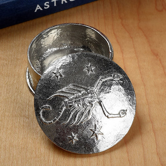 A beautifully detailed and textured Scorpio scorpion zodiac sign guards precious treasure on this personalised pewter trinket box. Pensonalised birthday gifts for Scorpios. The underside of the lid can be engraved with your personalised message.