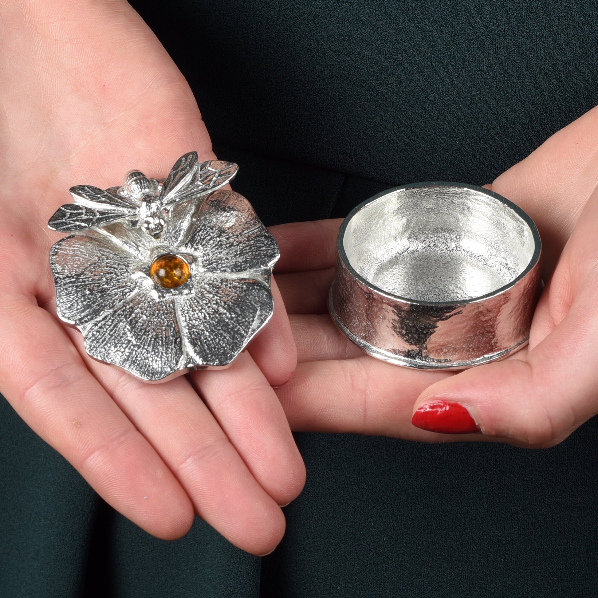 A forget me not flower pewter keepsake trinket box with an amber stone in the middle with a bee sculpture. Bee gifts, gifts for bee lovers.