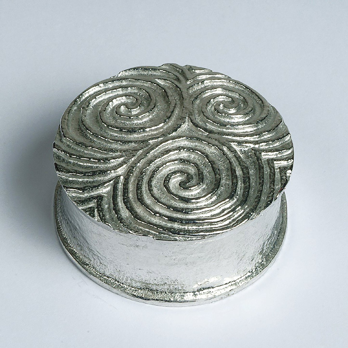 A detailed, striking and wonderfully textured Neolithic Spiral of Life Treskelion pewter trinket box. The lid features a relief of the spiral of life found in many Neolithic carvings. Celtic gifts.