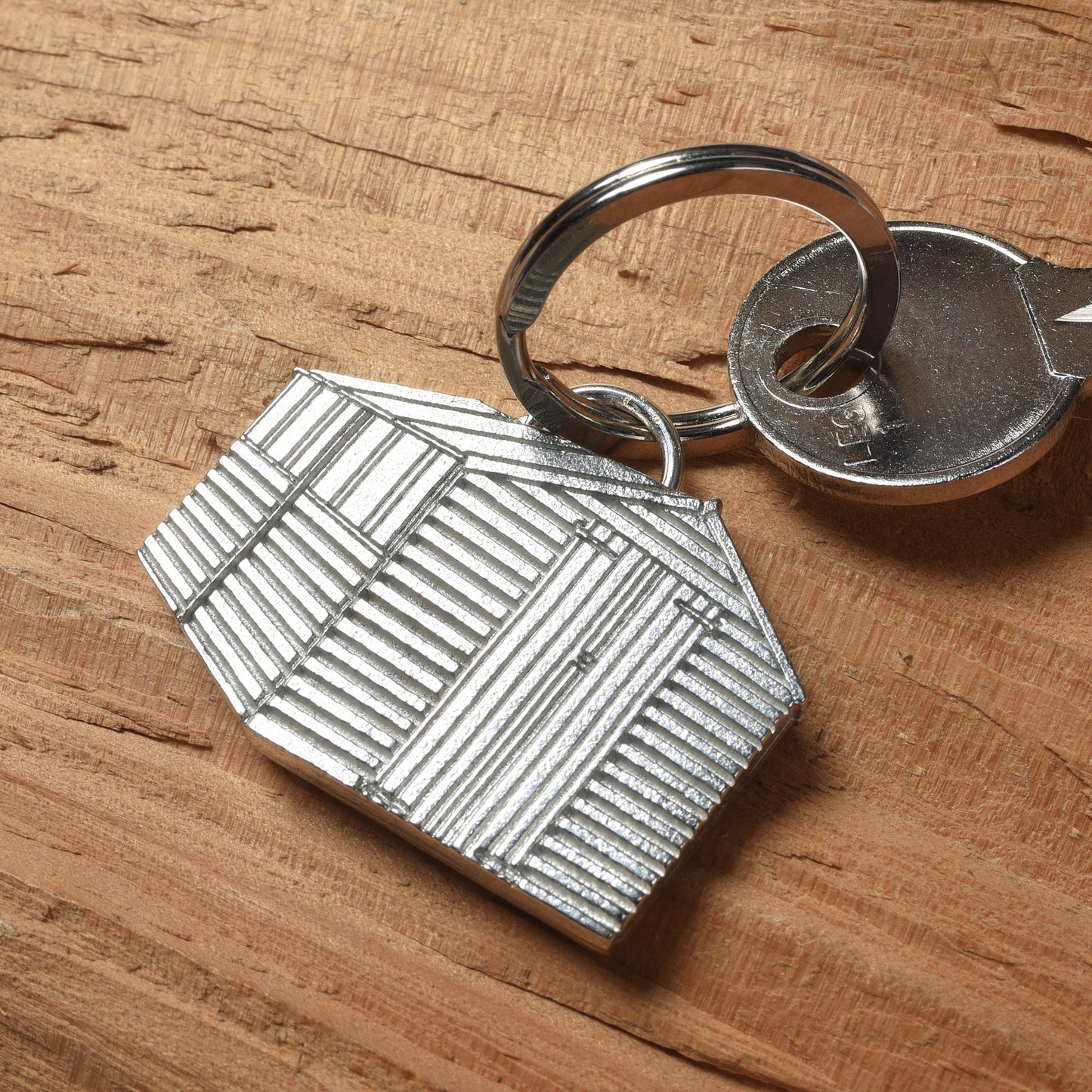 A solid pewter garden shed keyring on a quality stainless steel ring. Gifts for gardeners, gardeners gifts, useful gifts, housewarming gifts handmade in the UK