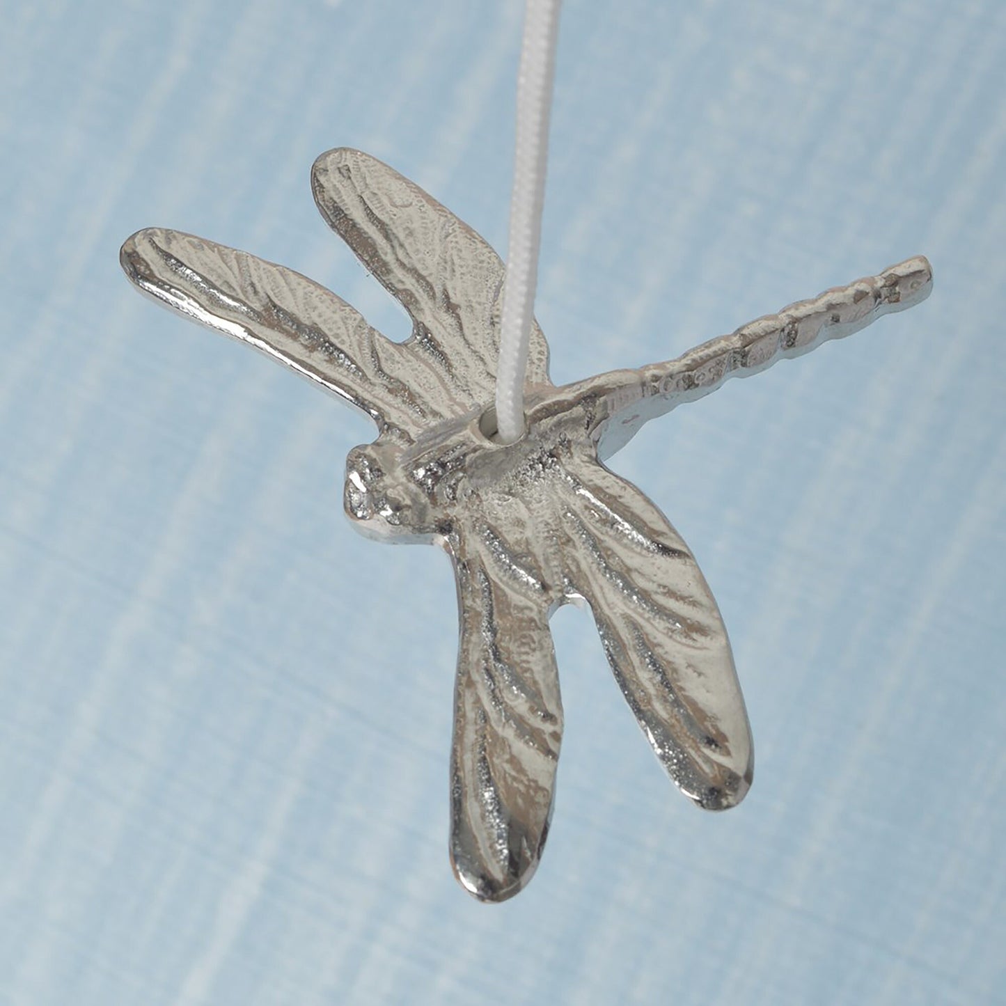 Dragonfly bathroom light pull or cord pull. A tactile and decorative pewter dragonfly hangs at the bottom of the bathroom light switch cord. ideal little housewarming gifts. Dragonfly gifts.