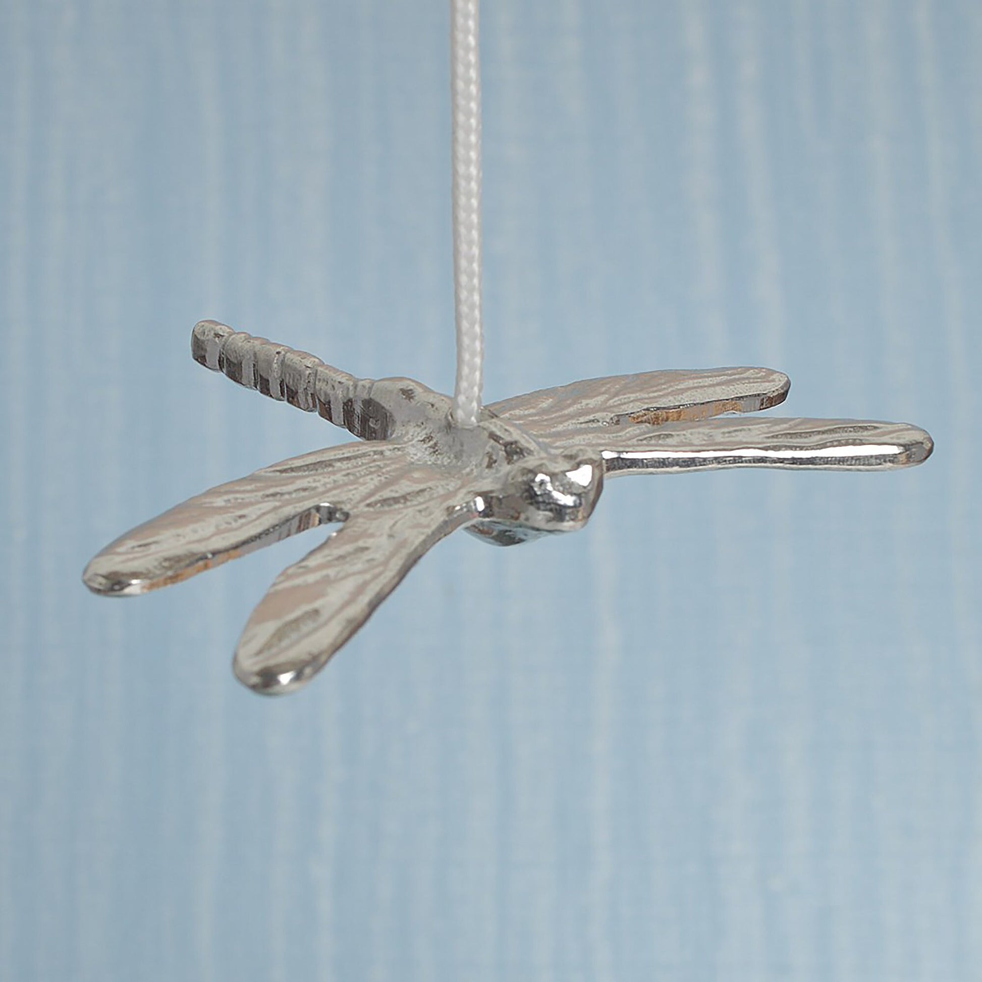 Dragonfly bathroom light pull or cord pull. A tactile and decorative pewter dragonfly hangs at the bottom of the bathroom light switch cord. ideal little housewarming gifts. Dragonfly gifts.