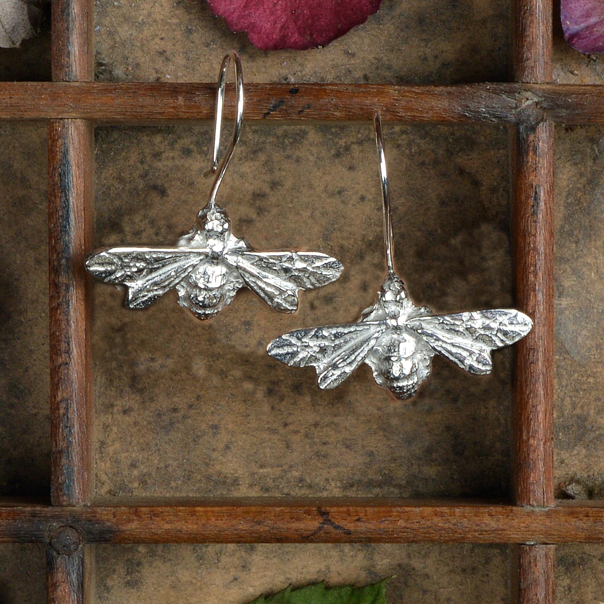 Bee drop earrings, pewter bees on Sterling silver ear hooks. Pewter and silver bee jewellery gifts, handmade in the UK by Glover and Smith