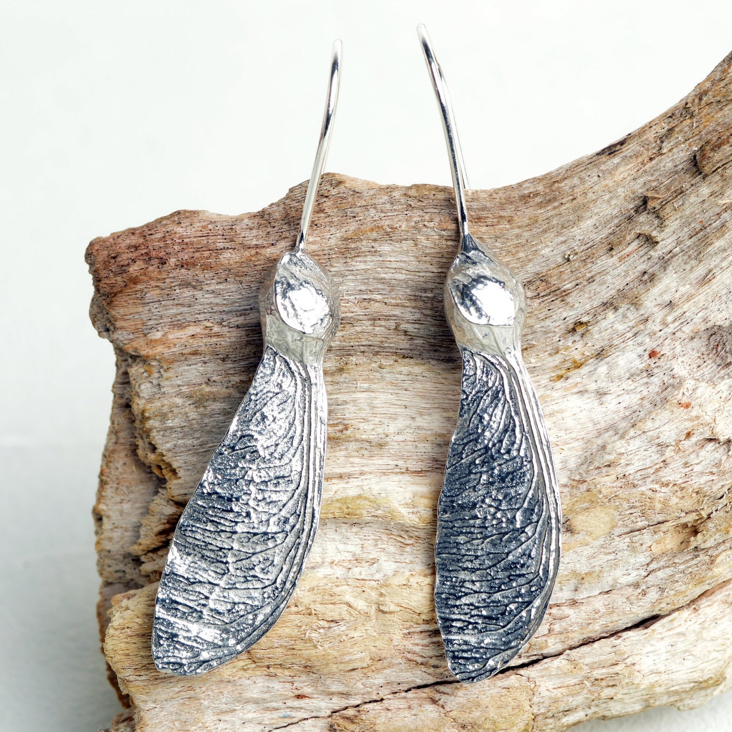 Sycamore key drop earrings, pewter sycamore keys on Sterling silver ear hooks. Pewter and silver sycamore key jewellery gifts, handmade in the UK by Glover and Smith