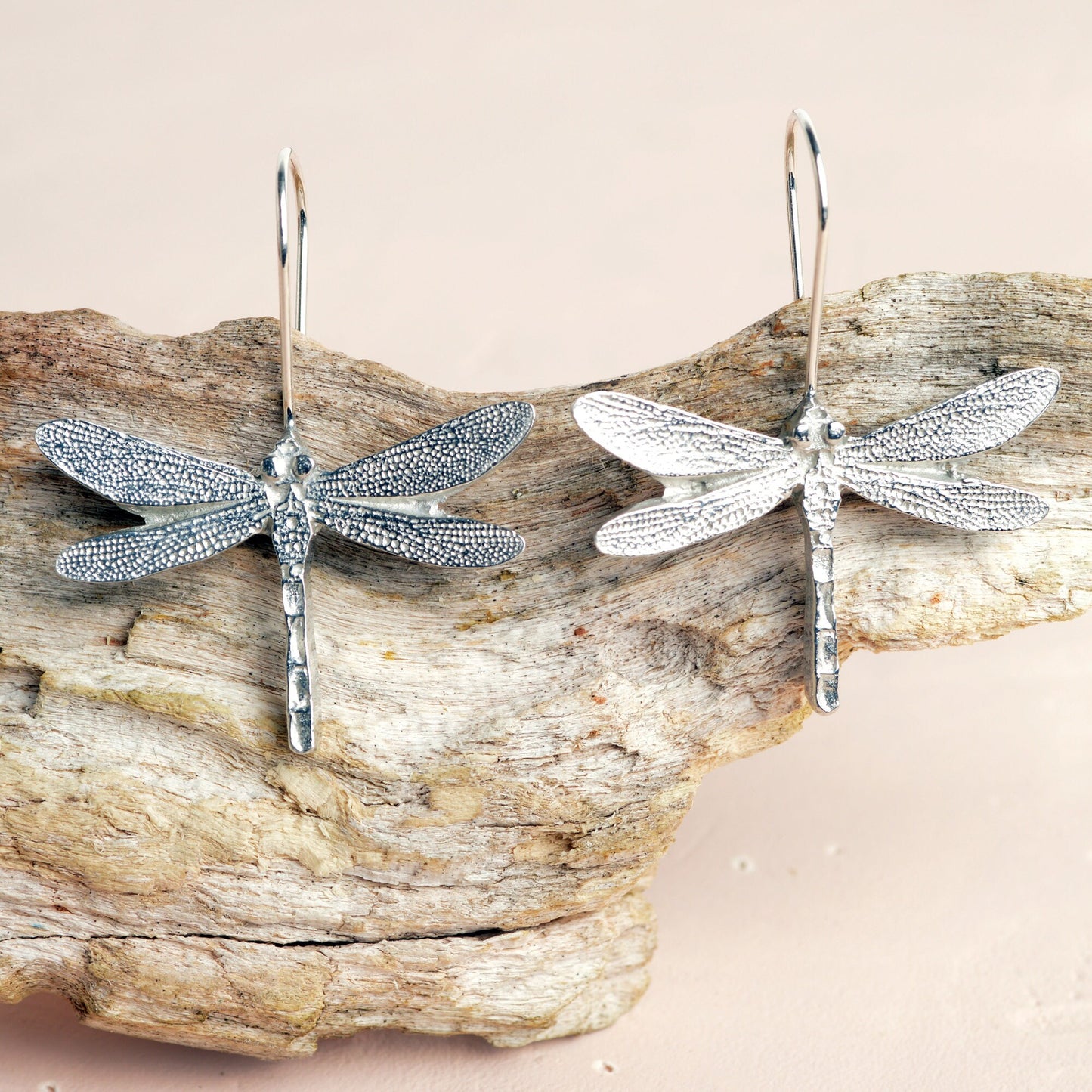 Dragonfly drop earrings, pewter dragonflies on Sterling silver ear hooks. Pewter and silver dragonfly jewellery gifts, handmade in the UK by Glover and Smith