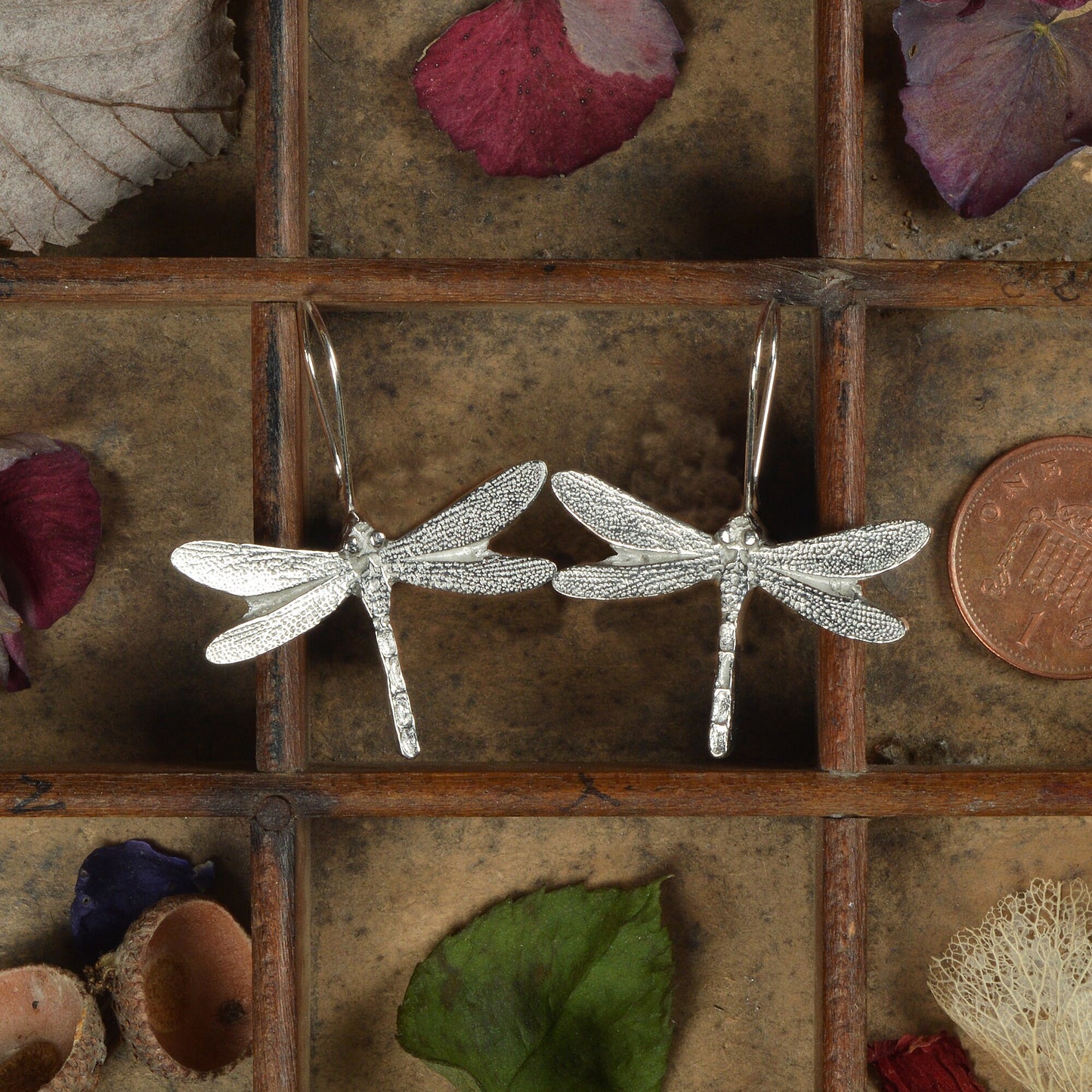 Dragonfly drop earrings, pewter dragonflies on Sterling silver ear hooks. Pewter and silver dragonfly jewellery gifts, handmade in the UK by Glover and Smith