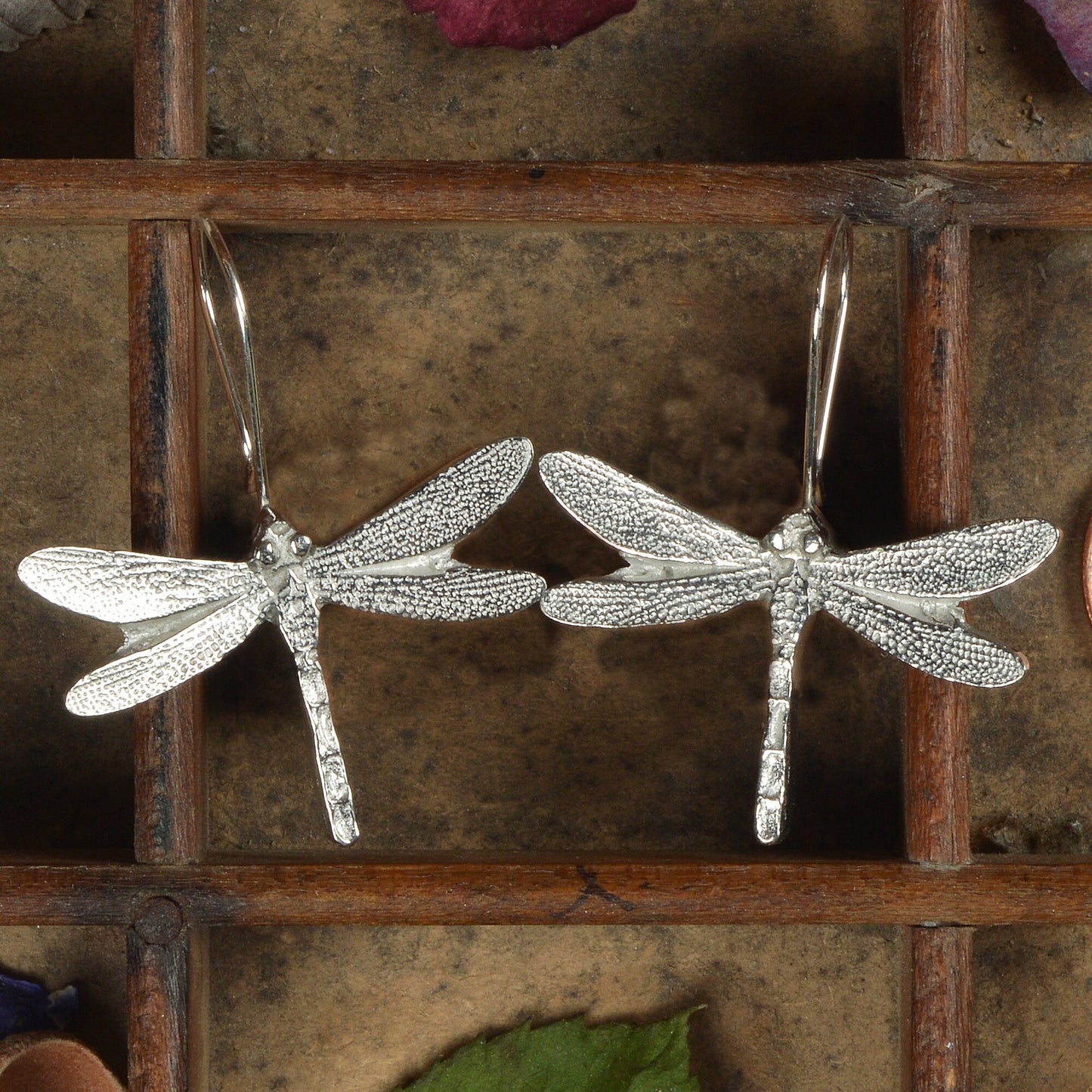 Dragonfly drop earrings, pewter dragonflies on Sterling silver ear hooks. Pewter and silver dragonfly jewellery gifts, handmade in the UK by Glover and Smith