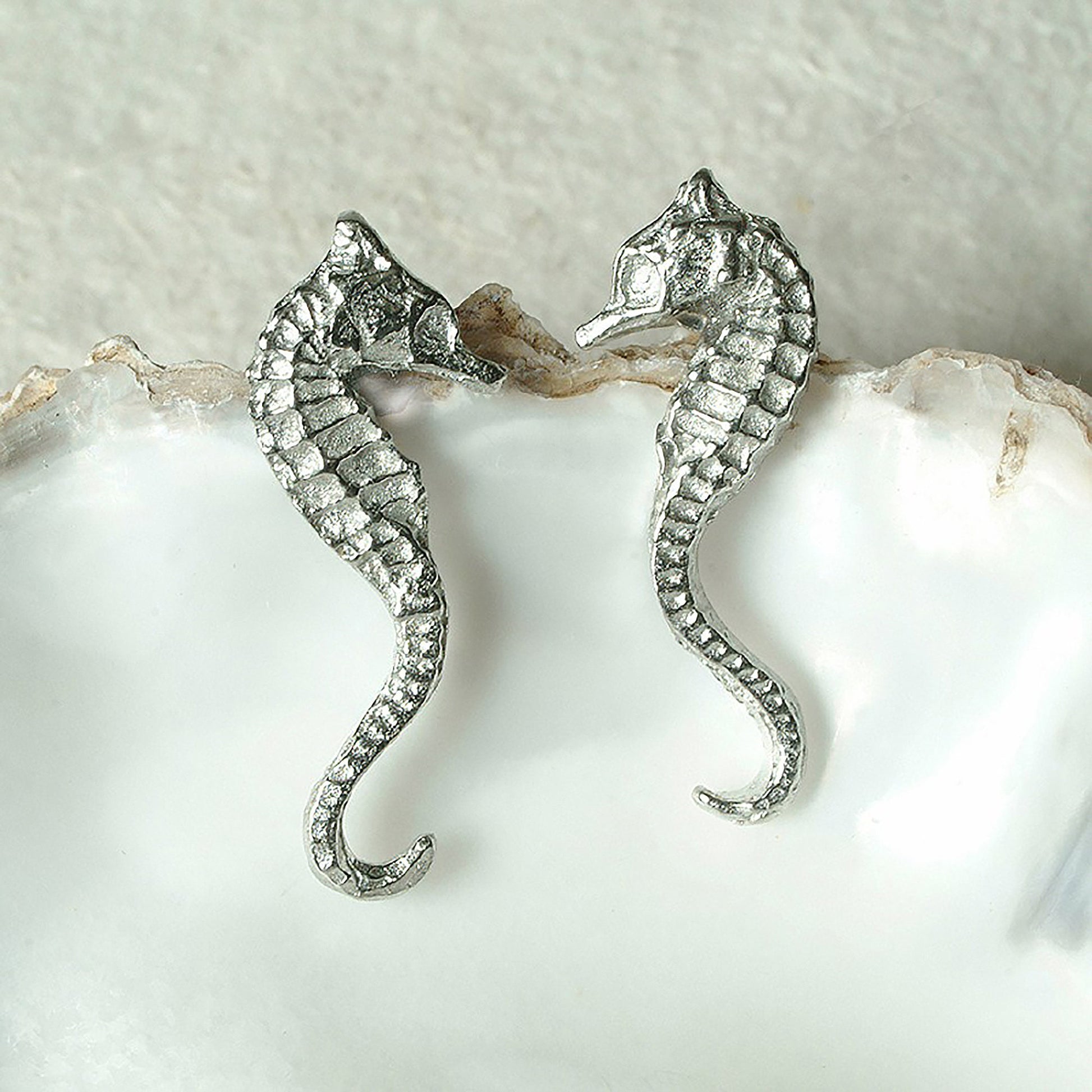 Seahorse stud earrings, pewter seahorses on Sterling silver stud posts. Pewter and silver seahorse jewellery gifts, handmade in the UK by Glover and Smith