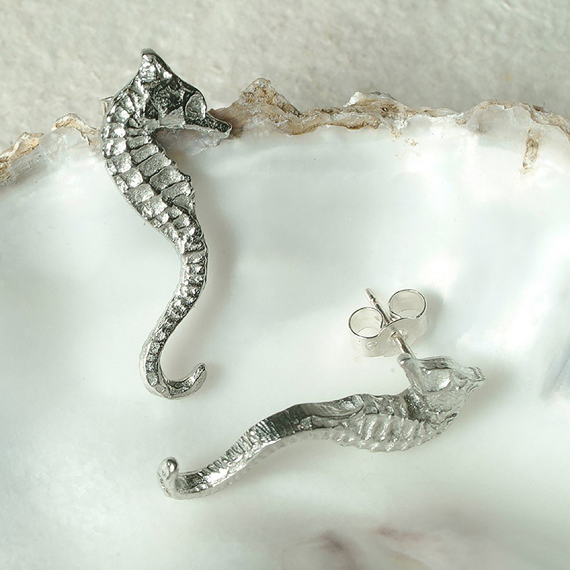 Seahorse stud earrings, pewter seahorses on Sterling silver stud posts. Pewter and silver seahorse jewellery gifts, handmade in the UK by Glover and Smith