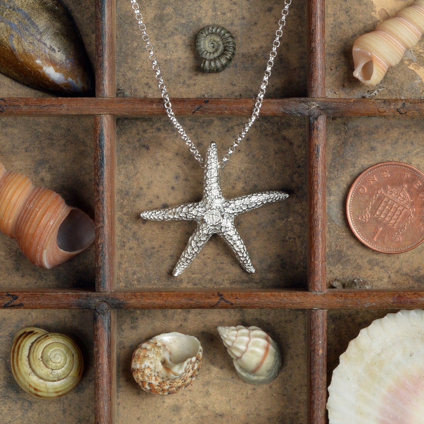 A delicate and detailed pewter starfish necklace on an 18" Sterling silver chain. Great jewellery gifts for her, nautical gifts starfish gifts. The perfect 10th tin 10 year wedding anniversary gift (Our pewter is 95% tin). Made in Britain with love. 