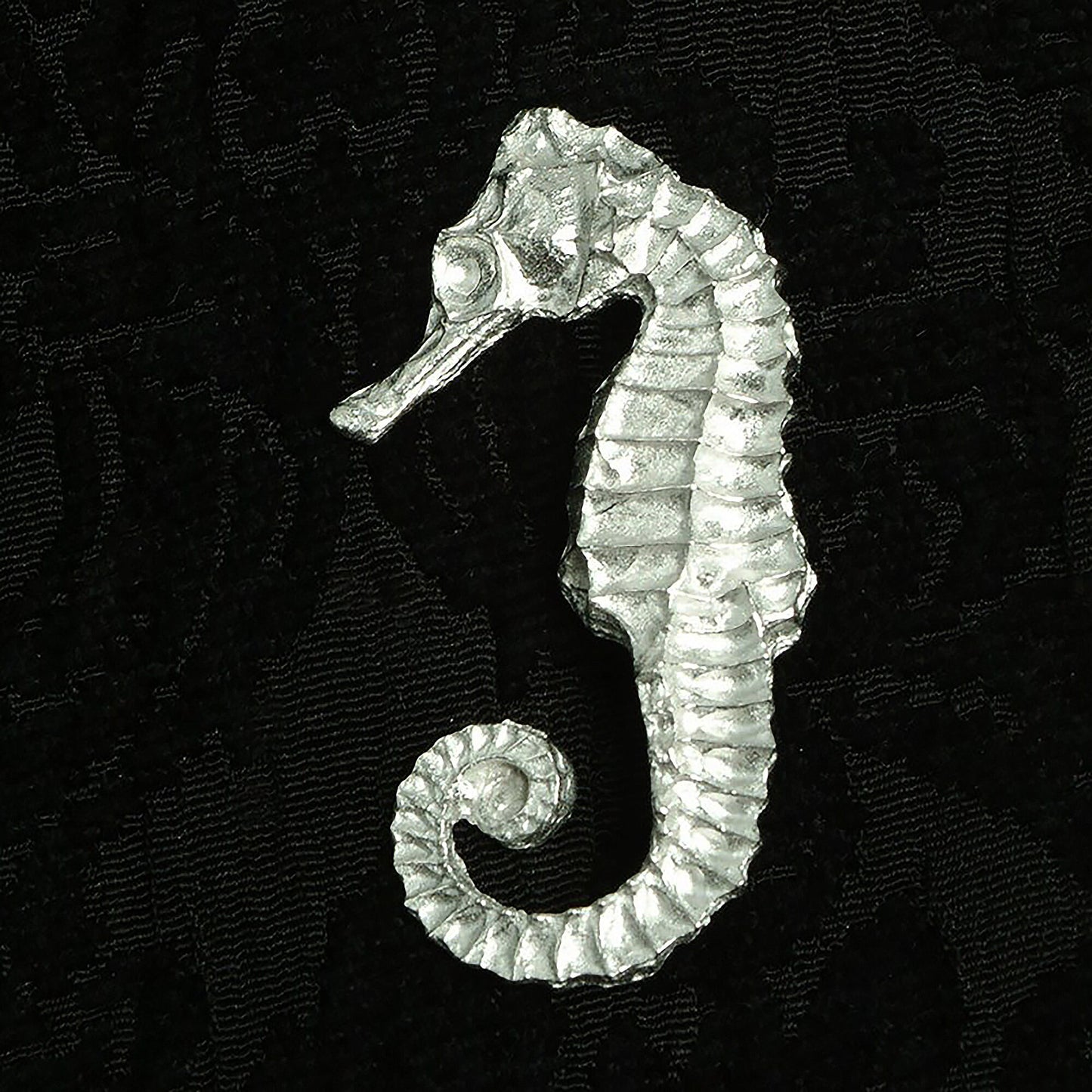 An eye catching and beautifully detailed seahorse pewter brooch. Great nautical seahorse gifts for lovers of the seaside and the ocean. Each seahorse brooch is 5.5cm (2.2 inches) tall and is attached with a metal clasp pin.