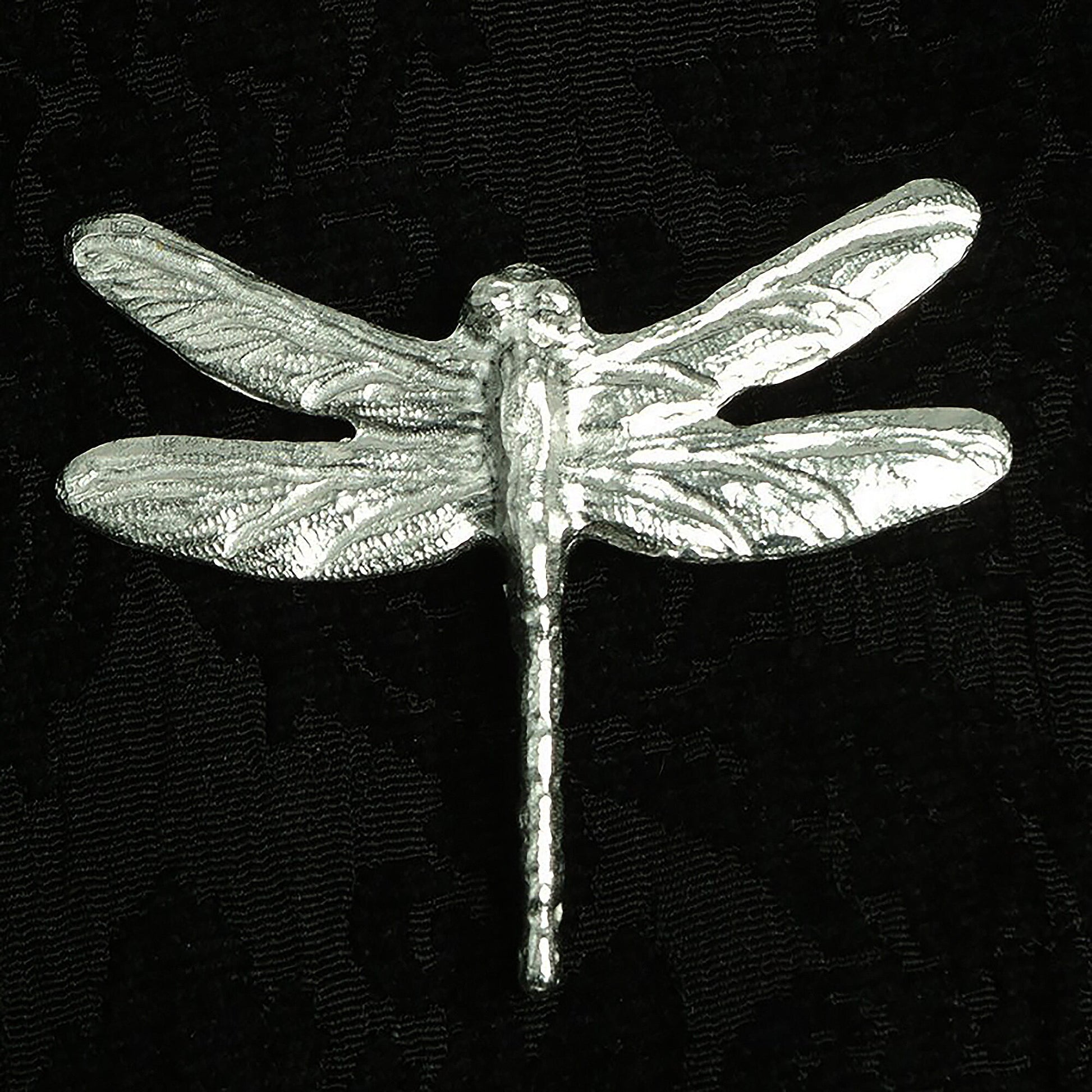 A beautifully detailed and textured dragonfly pewter brooch. Dragonfly gifts for dragonfly lovers. Ideal nature jewellery gifts for her. Each dragonfly brooch is 5.5cm (2.2 inches) tall and is attached with a metal clasp pin.