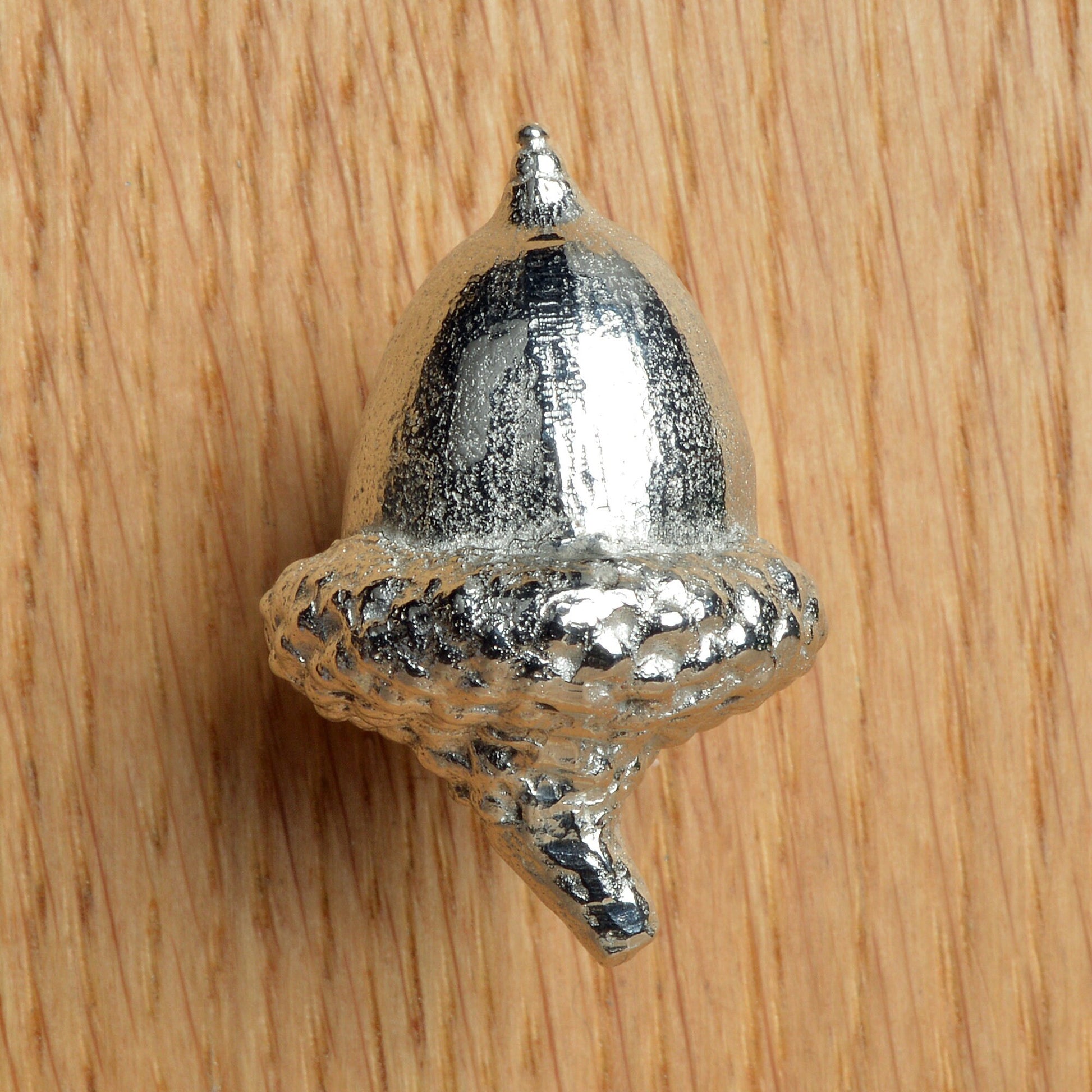 A solid pewter cabinet handle, cupboard knob, furniture handle or drawer pull in the shape of a detailed acorn. Organic, unusual handles UK handmade with finesse