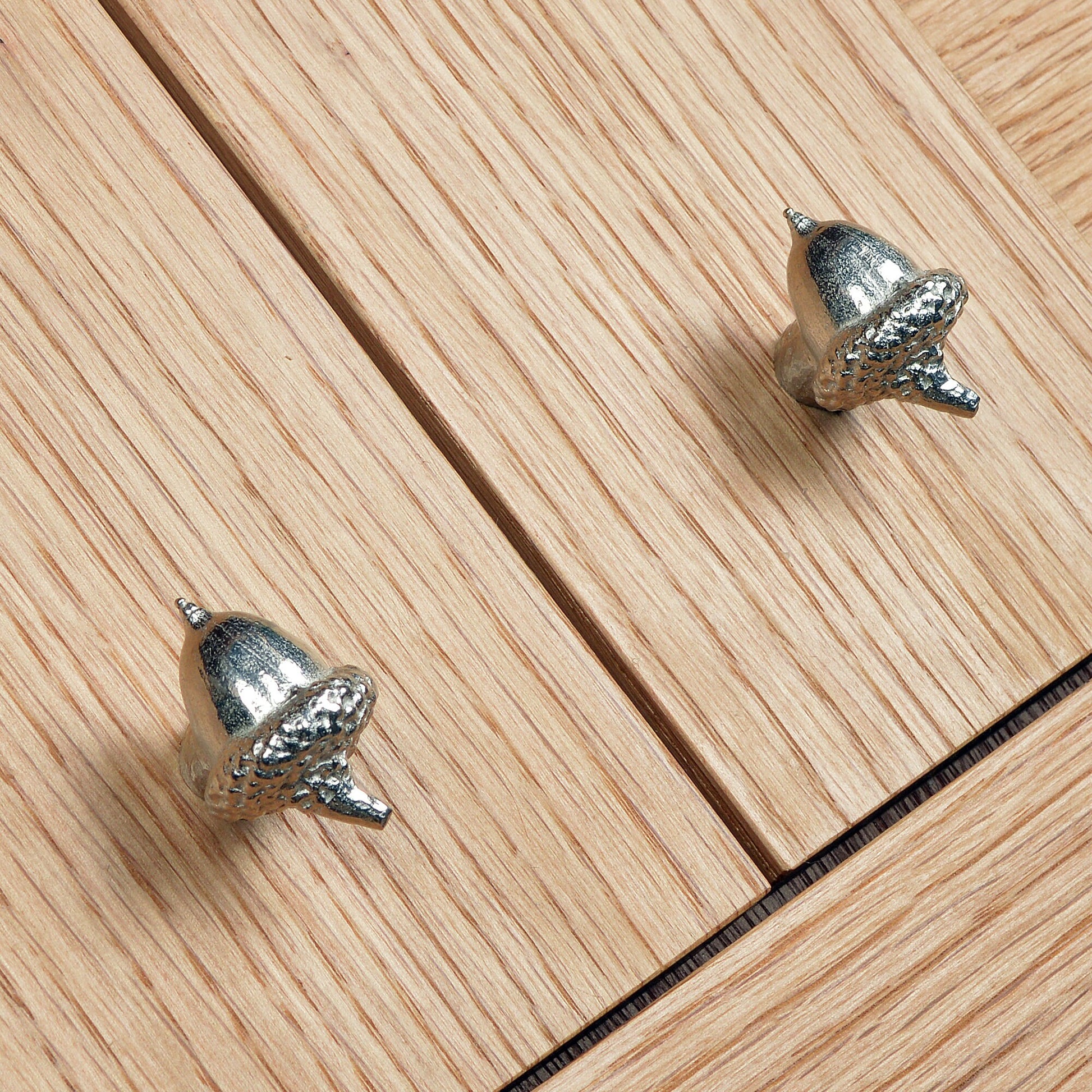 A solid pewter cabinet handle, cupboard knob, furniture handle or drawer pull in the shape of a detailed acorn. Organic, unusual handles UK handmade with finesse