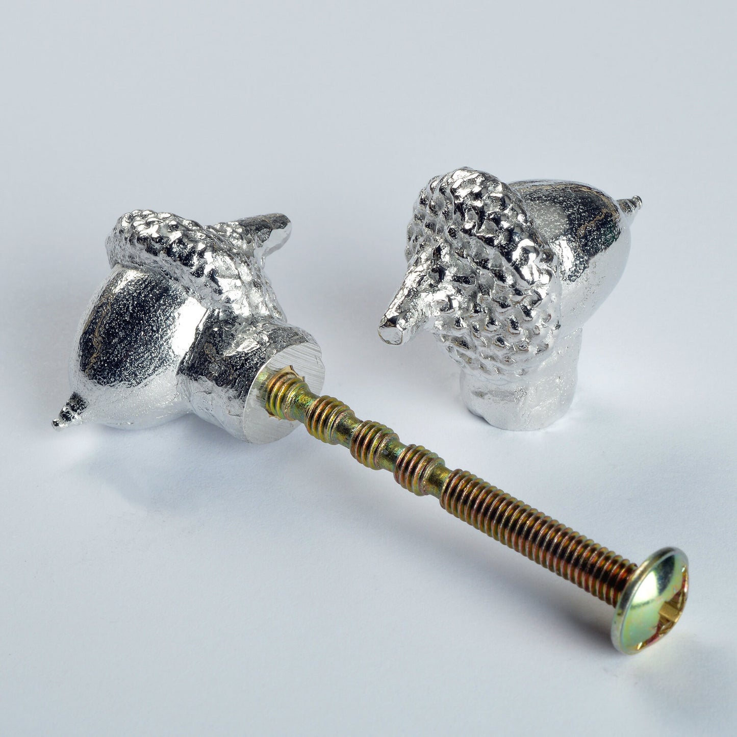 A solid pewter cabinet handle, cupboard knob, furniture handle or drawer pull in the shape of a detailed acorn. Organic, unusual handles UK handmade with finesse