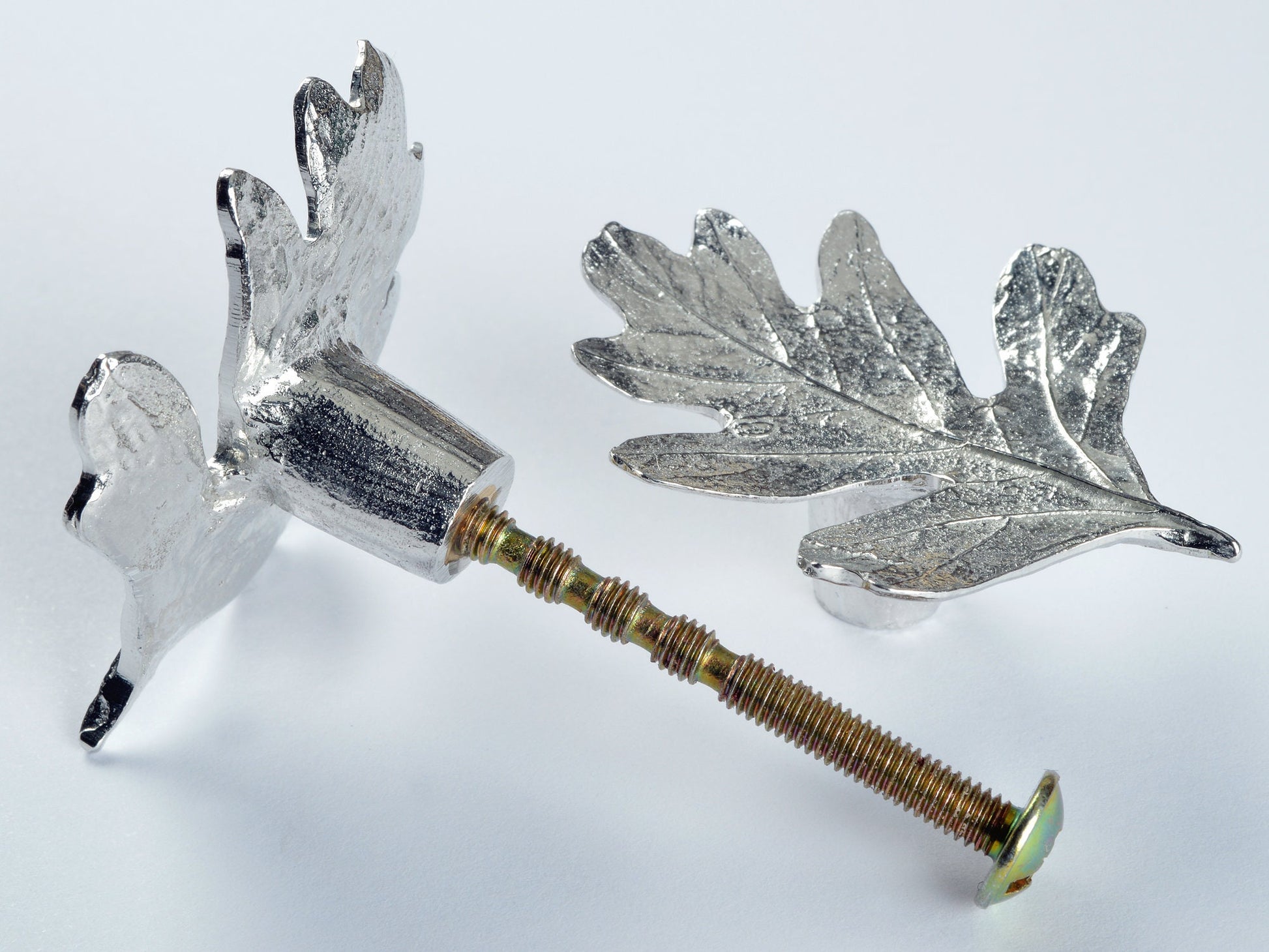 A solid pewter cabinet handle, cupboard knob, furniture handle or drawer pull in the shape of a detailed hawthorn leaf. Organic, unusual handles UK handmade with finesse